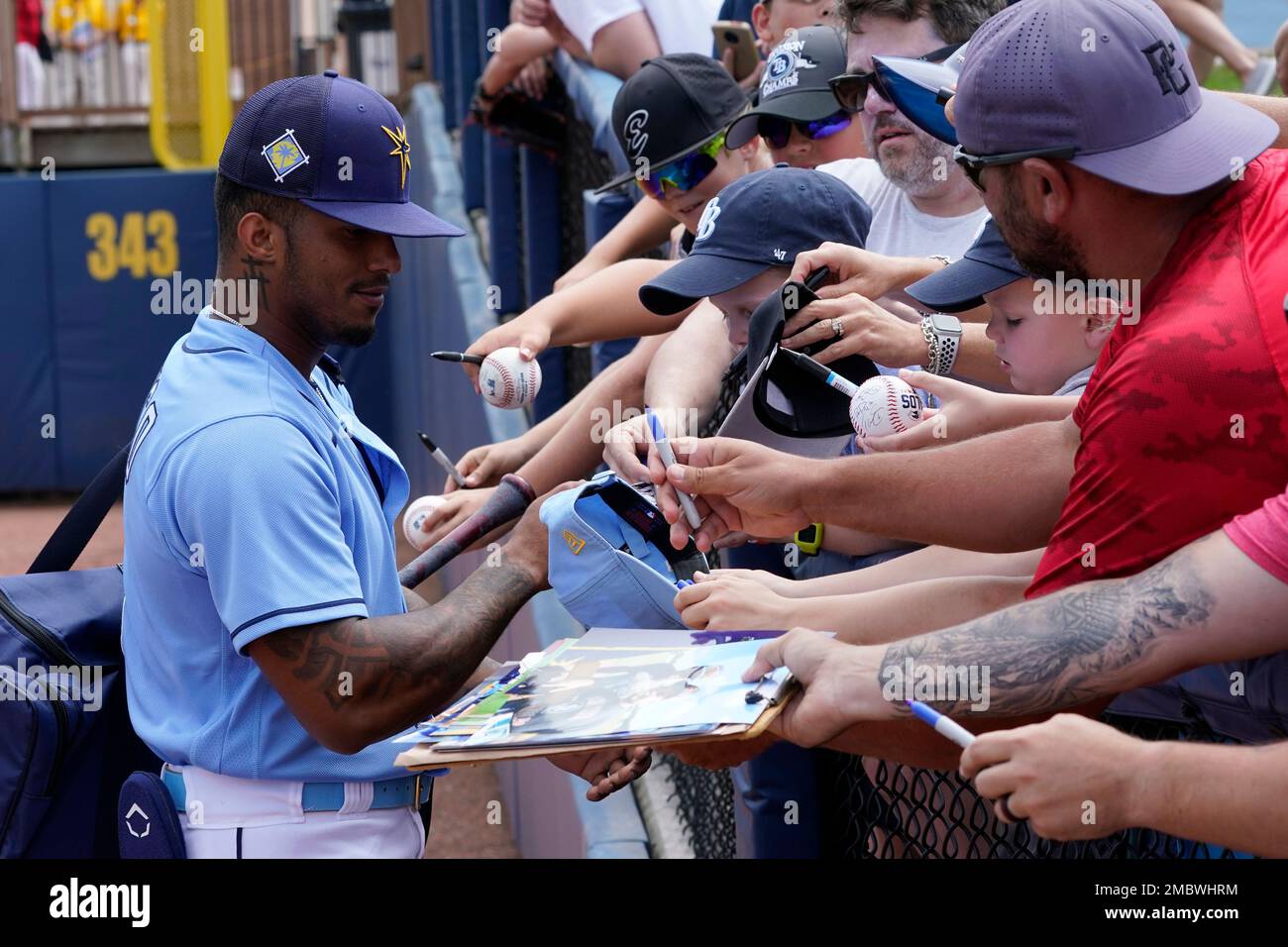 Tampa Bay Rays shortstop Wander Franco (5) signs autographs prior