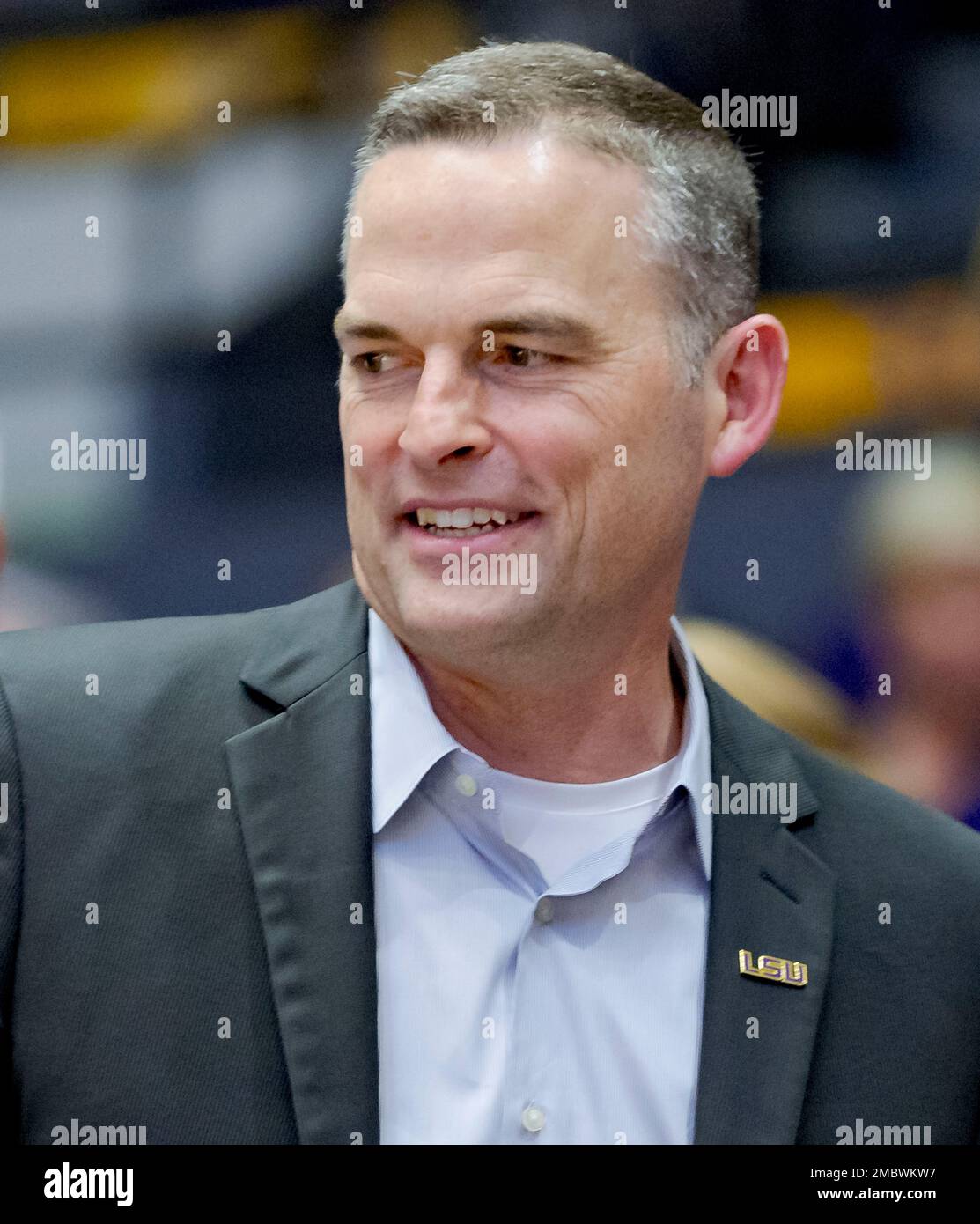 Former Murray State head coach Matt McMahon, center, talks with LSU fans after being hired as the head men's basketball coach for LSU during the second half of a women's college basketball Former Murray State head coach Matt McMahon, center, talks with LSU fans after being hired as the head men's basketball coach for LSU during the second half of a women's college basketball