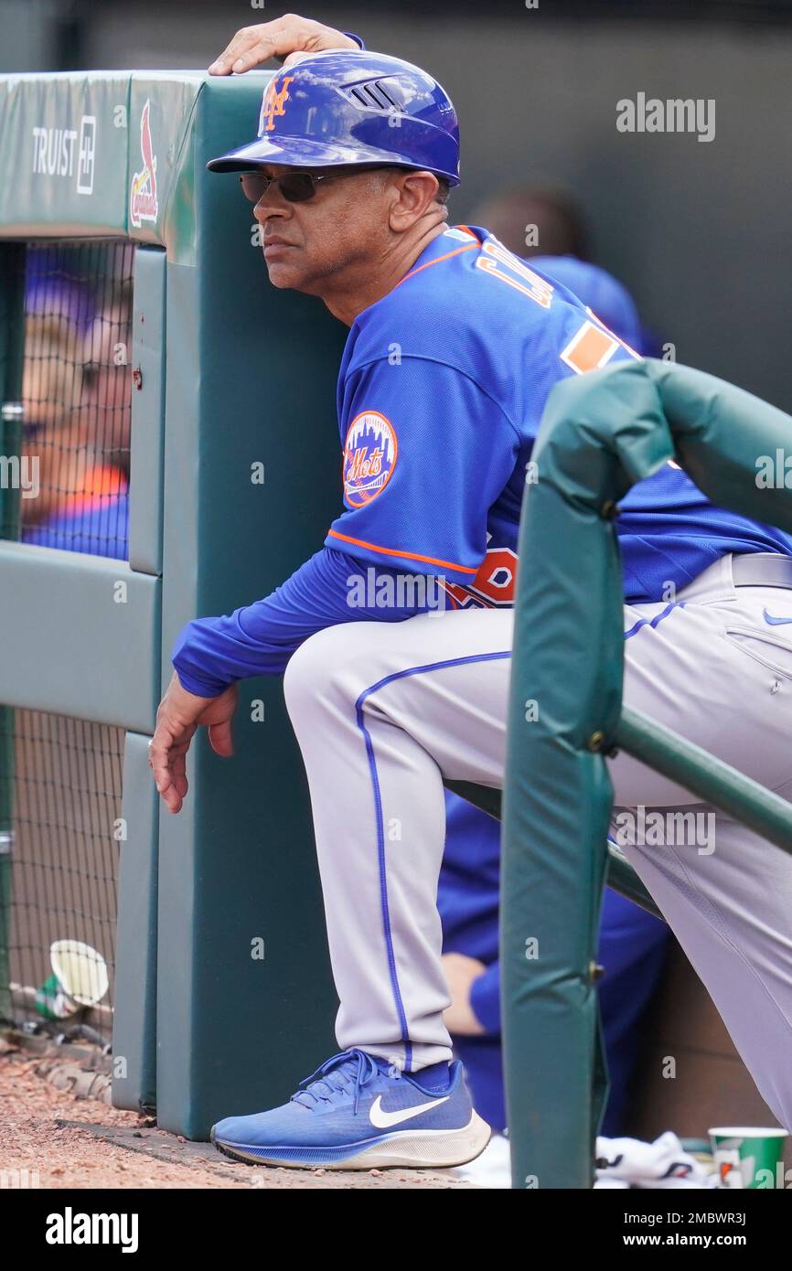 New York Mets third base coach Joey Cora watches from the dugout in the  fifth inning of a spring training baseball game against the Miami Marlins,  Monday, March 21, 2022, in Jupiter