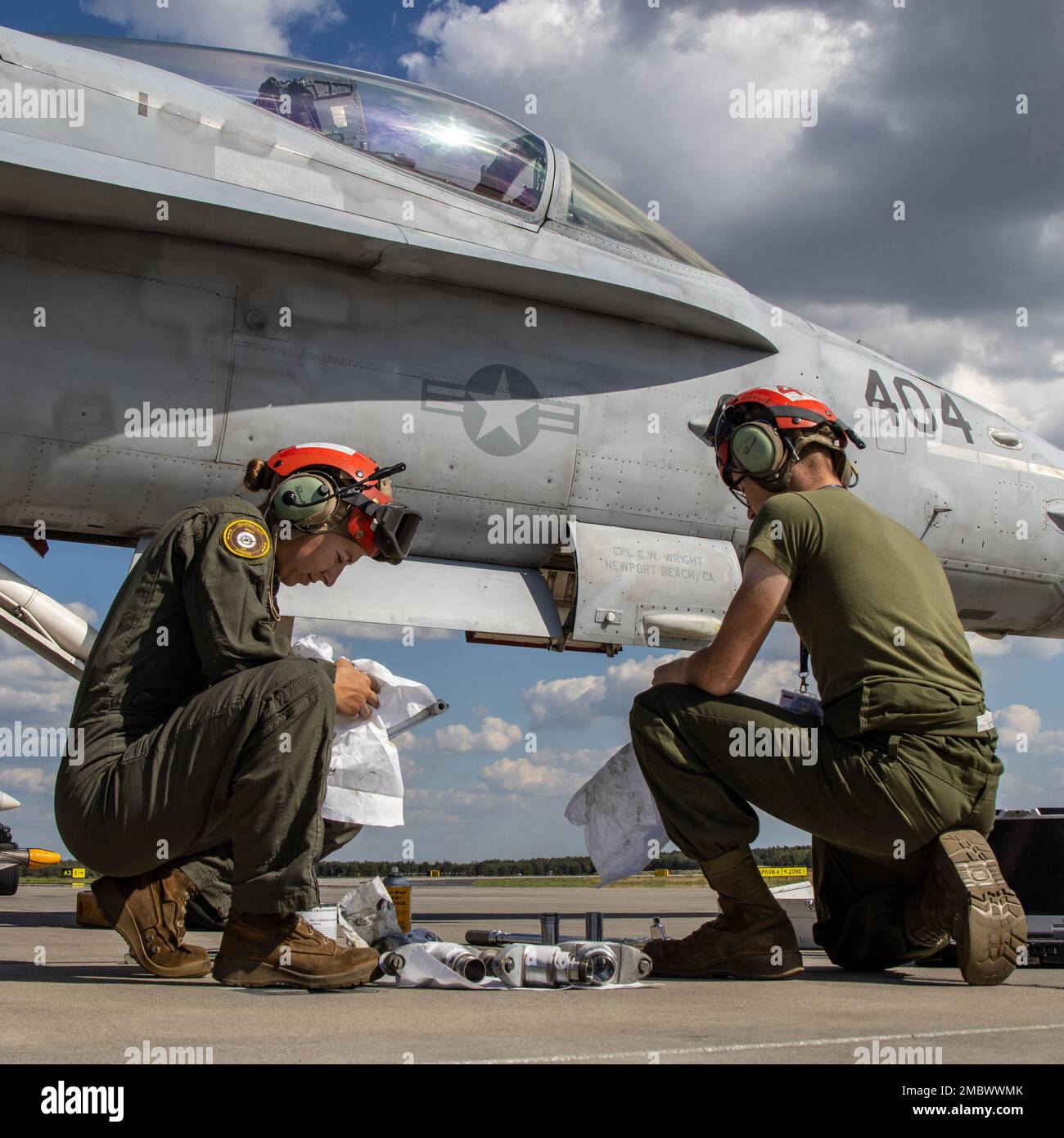 U.S. Marine Corps Cpl. Grace Simonsen with Marine Fighter U.S. Marine Corps Cpl. Grace Simonsen with Marine Fighter