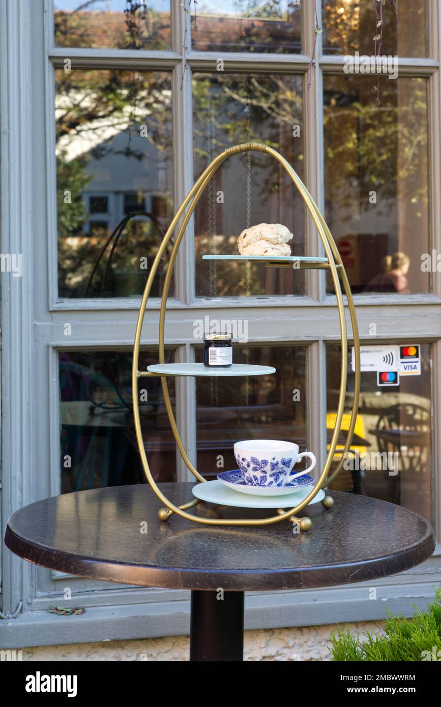 Cream tea set up on a tea stand Stock Photo Alamy