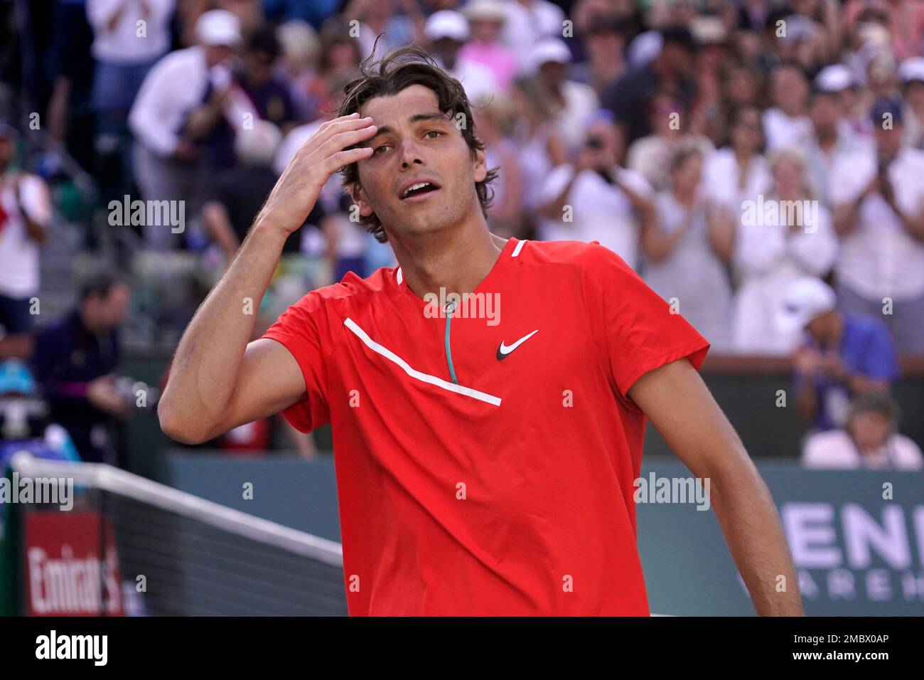 Taylor Fritz reacts after defeating Rafael Nadal, of Spain, in the mens singles finals at the BNP Paribas Open tennis tournament Sunday, March 20, 2022, in Indian Wells, Calif