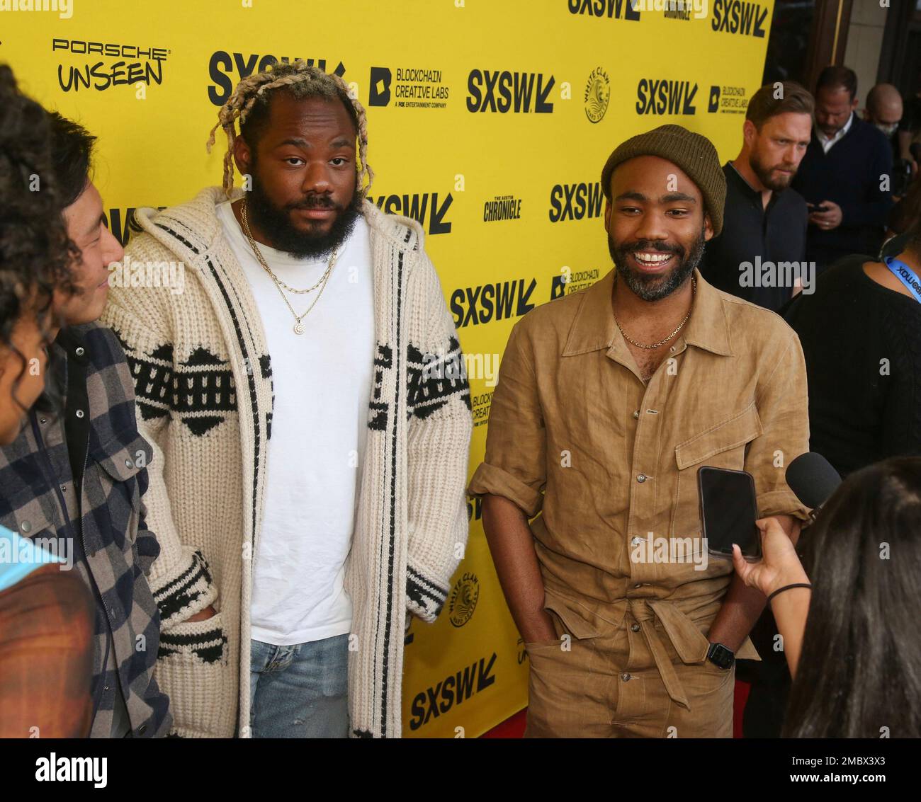Donald Glover, right, and Stephen Glover arrive for the "Atlanta" third