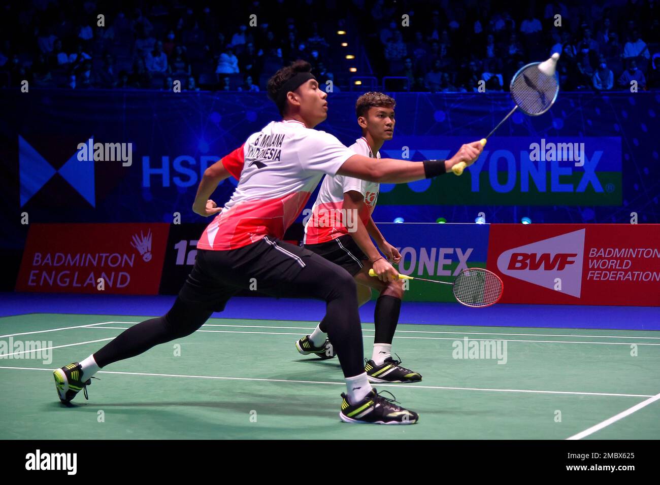 Indonesias Muhammad Shohibul Fikri and Bagas Maulana (right) celebrate victory over Indonesias Mohammad Ahshan and Hendra Setiawan during day five of the YONEX All England Open Badminton Championships at the Utilita Arena