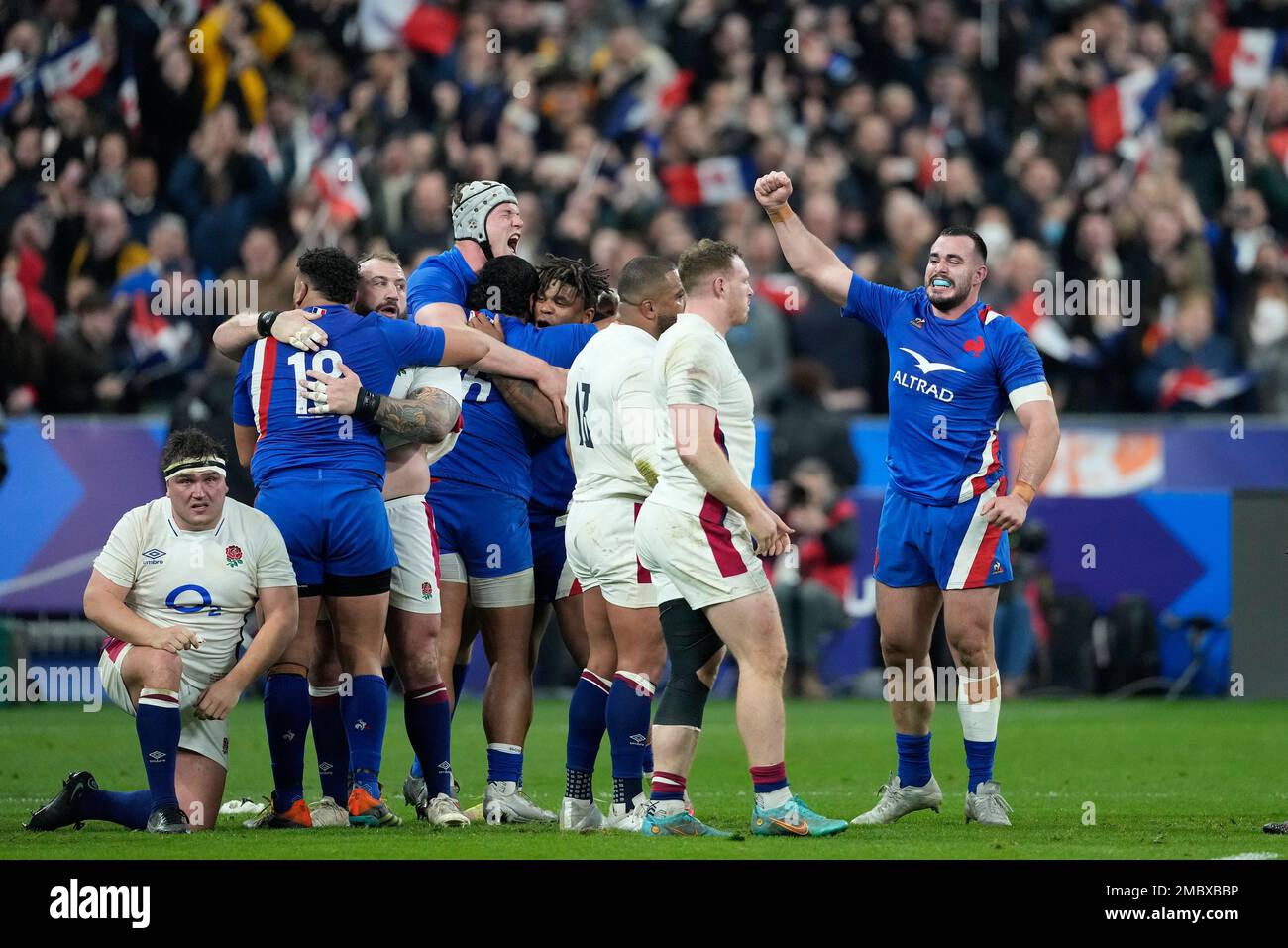 French players celebrate at the end of the Six Nations rugby union