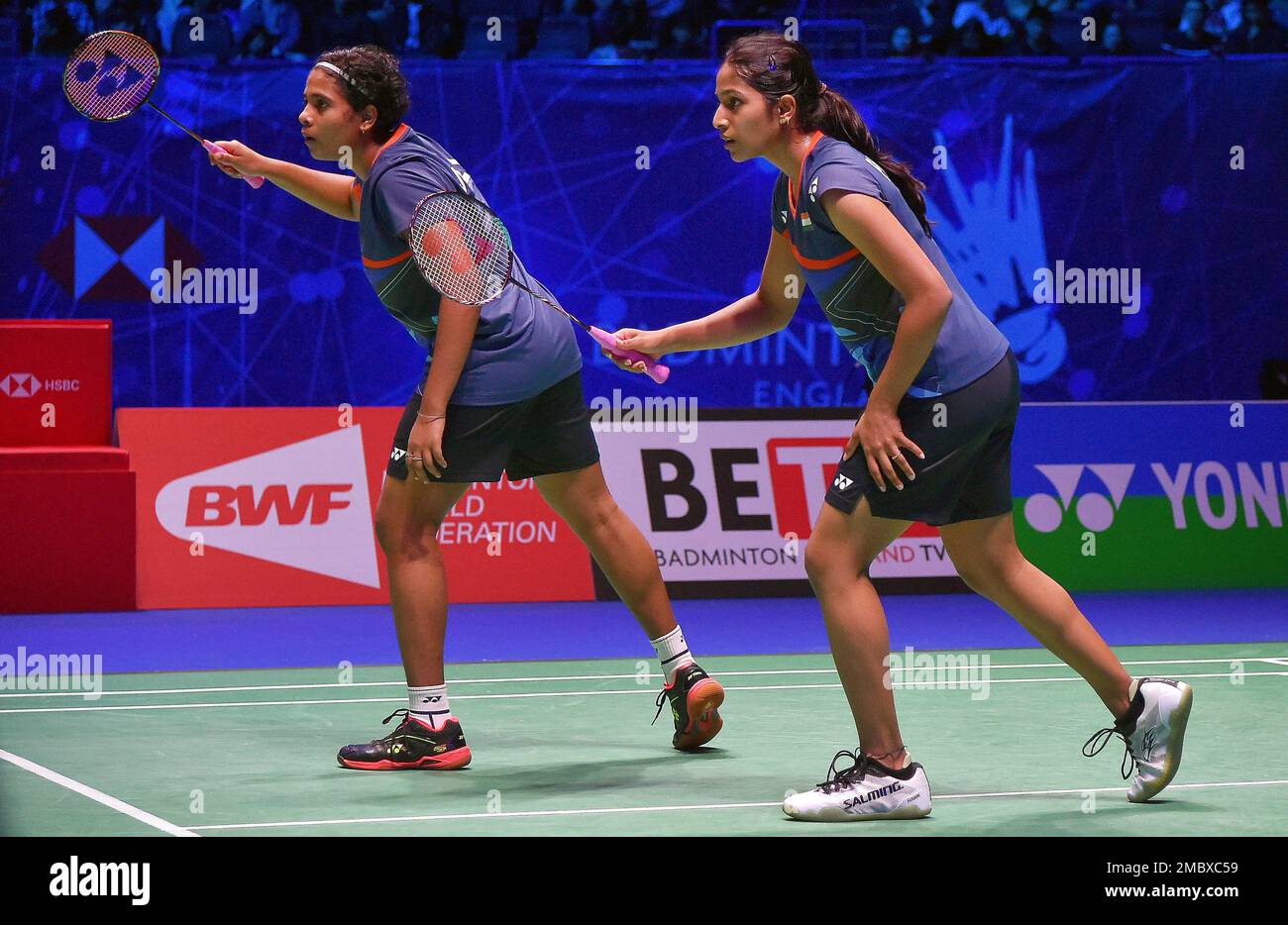 Indias Treesa Jolly and Gayatri Gopichand Pullella, right, compete against Chinas Zhang Shu Xian and Zhen Yu during the womens doubles semi final match at the All England Open Badminton Championships in