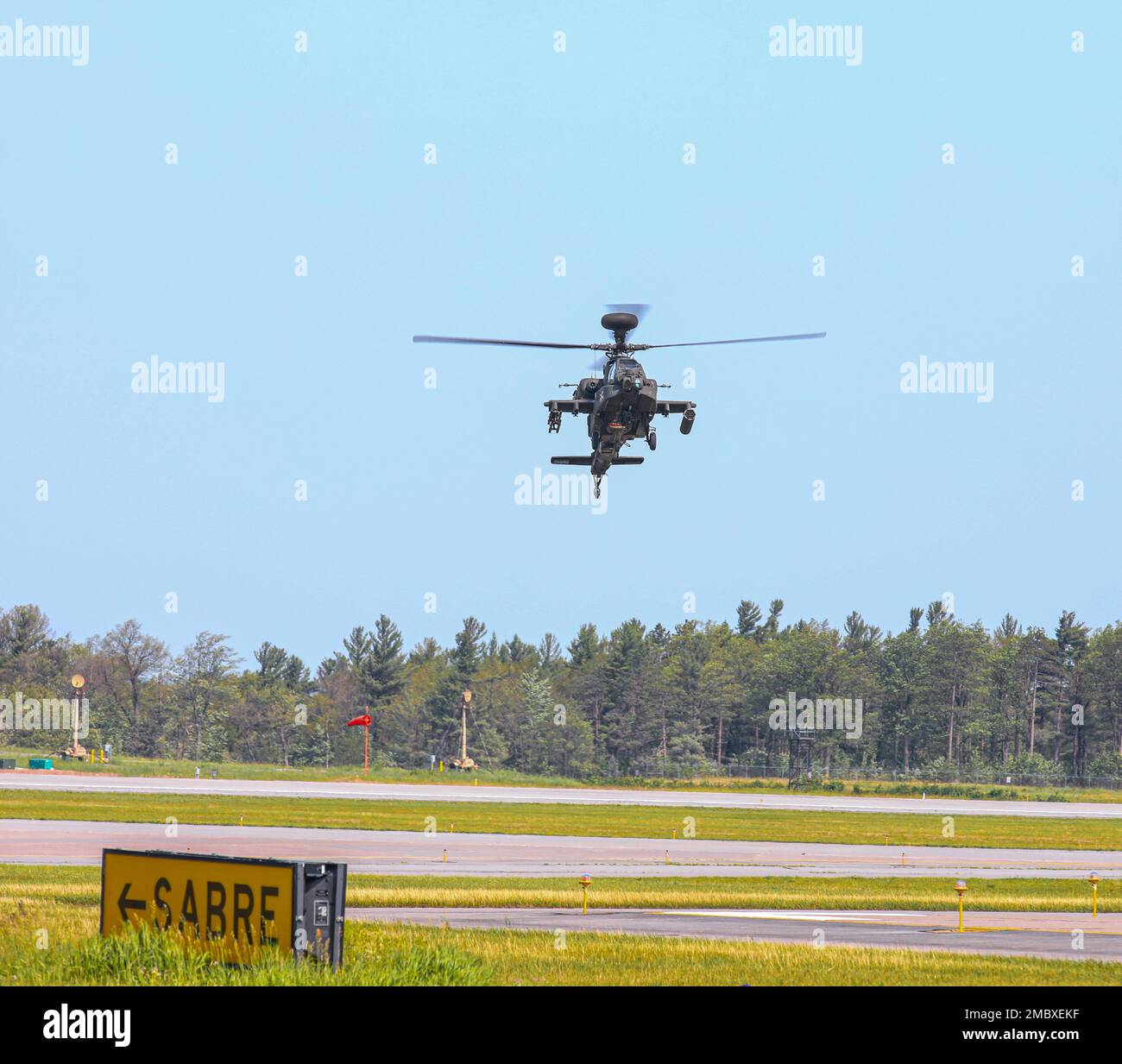 U.S. Army Lt. Col. Beau Rollie, 6-6 Air Cavalry Squadron commander, conducts his final flight as the 6-6 Squadron Commander on Fort Drum, NY Jun. 22, 2022. Lt. Col. Rollie was recieved by Cavalry Soldiers after he landed. Stock Photo