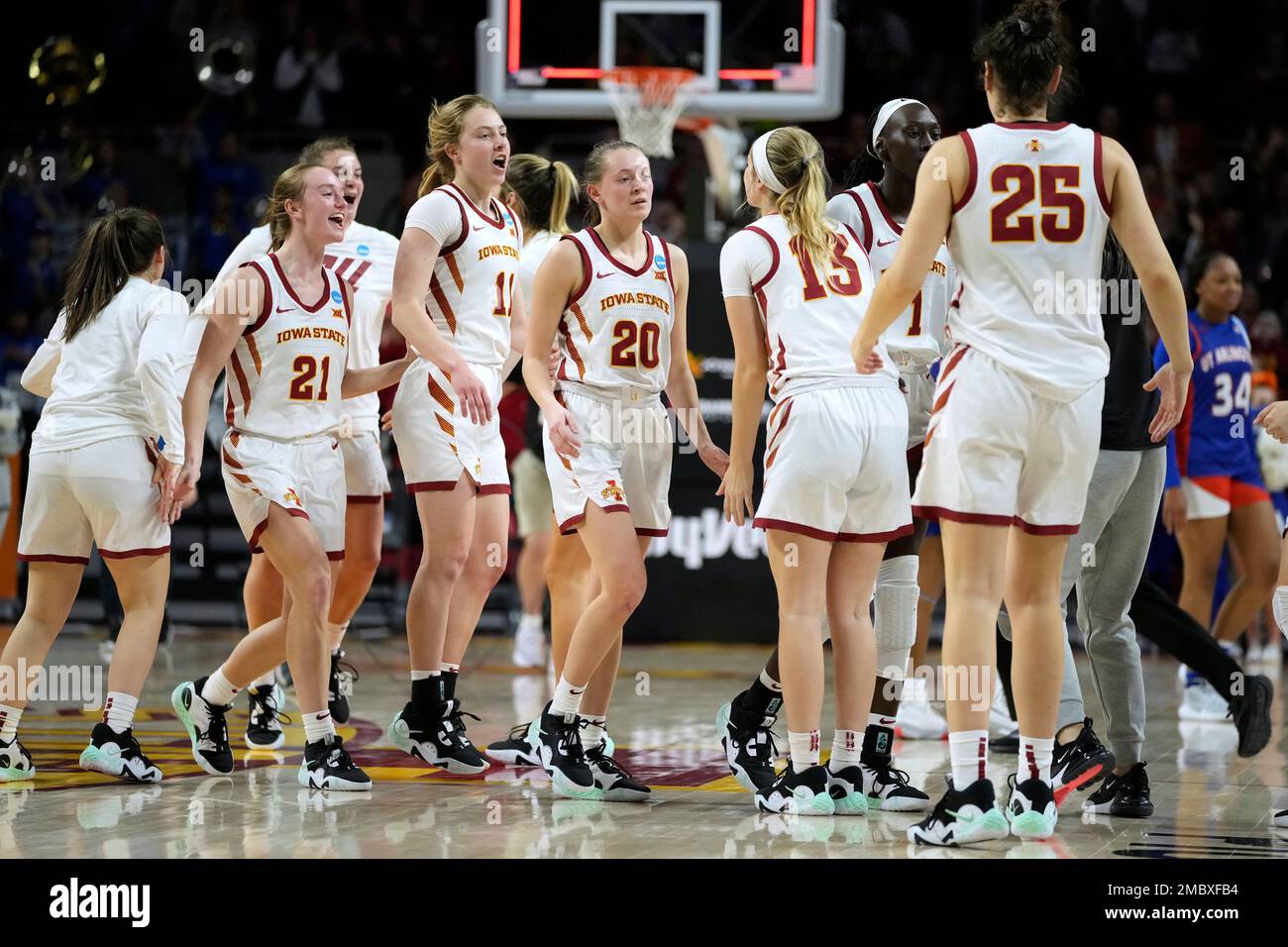 Iowa State players celebrate at the end of a first-round game against Texas-Arlington in the NCAA women's college basketball tournament, Friday, March 18, 2022, in Ames, Iowa. Iowa State won 78-71. (AP Photo/Charlie Neibergall) Stock Photo