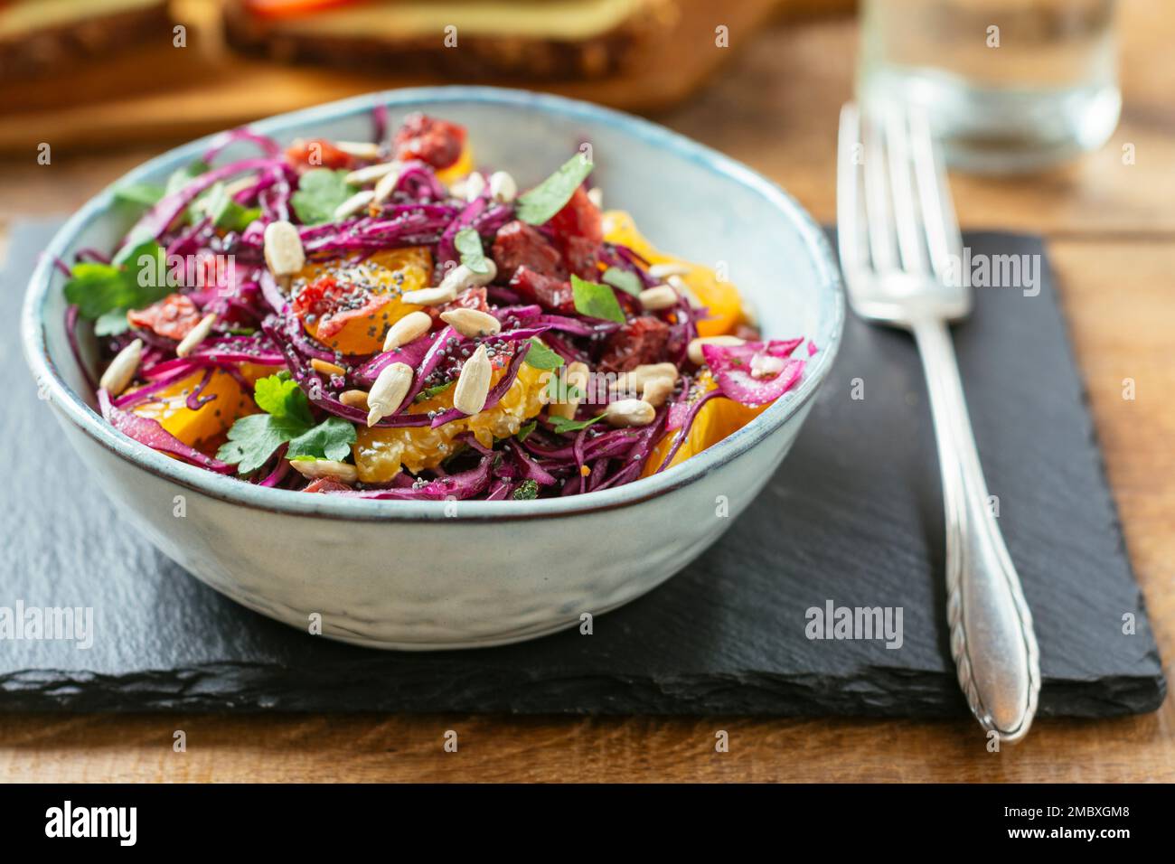 Bowl with a home made red cabbage slaw with mandarin oranges. Stock Photo