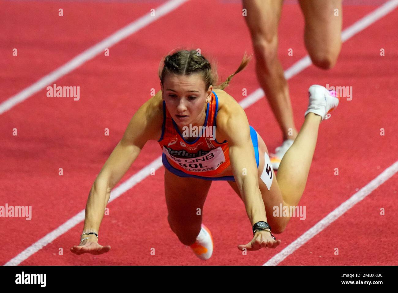 Femke Bol, of the Netherlands, falls down and hits her head on the ground crossing the finish line in a Womens 400 meters semifinal at the World Athletics Indoor Championships in Belgrade,