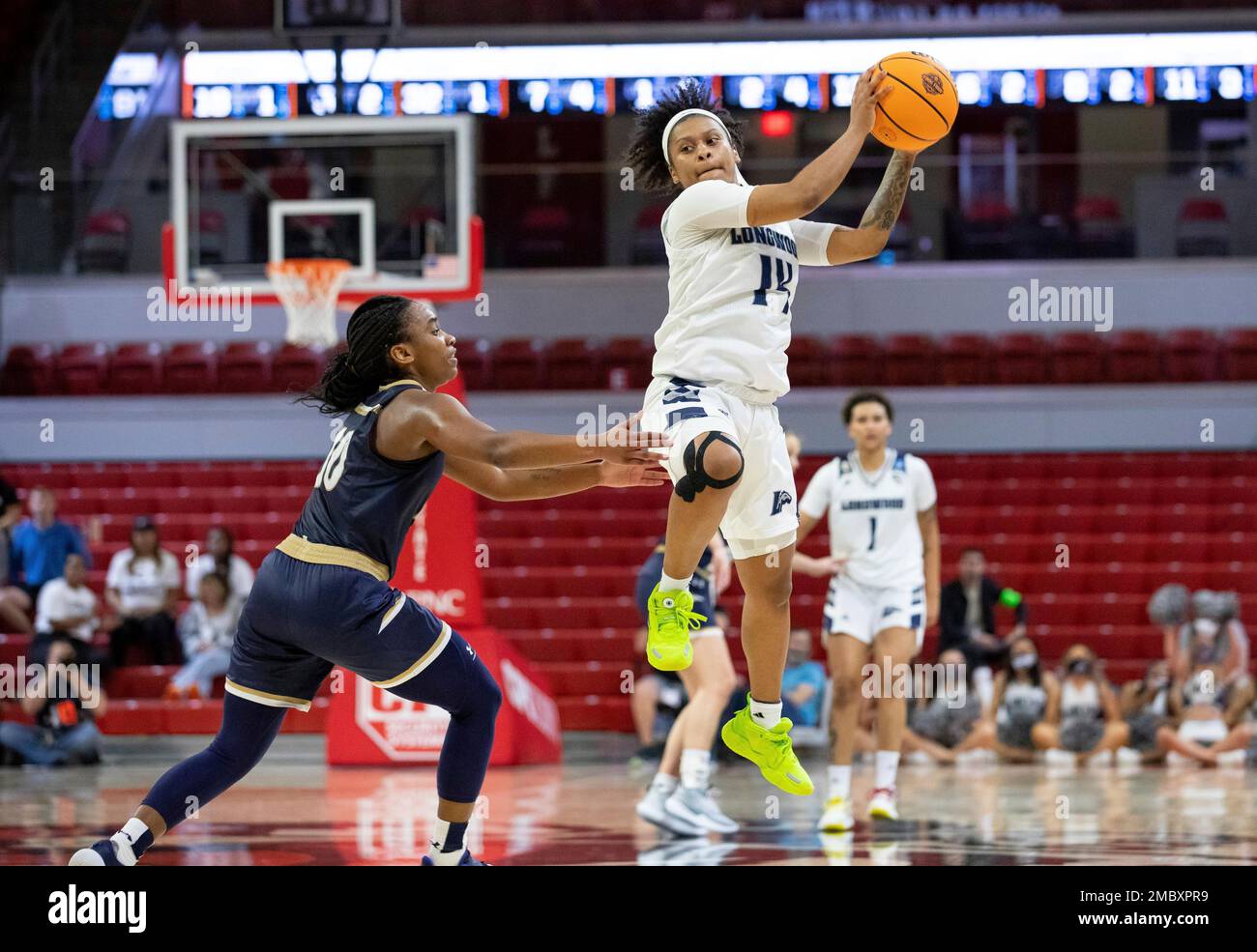 Longwood's Tra'Dayja Smith (14) receives an in-bound pass ahead of