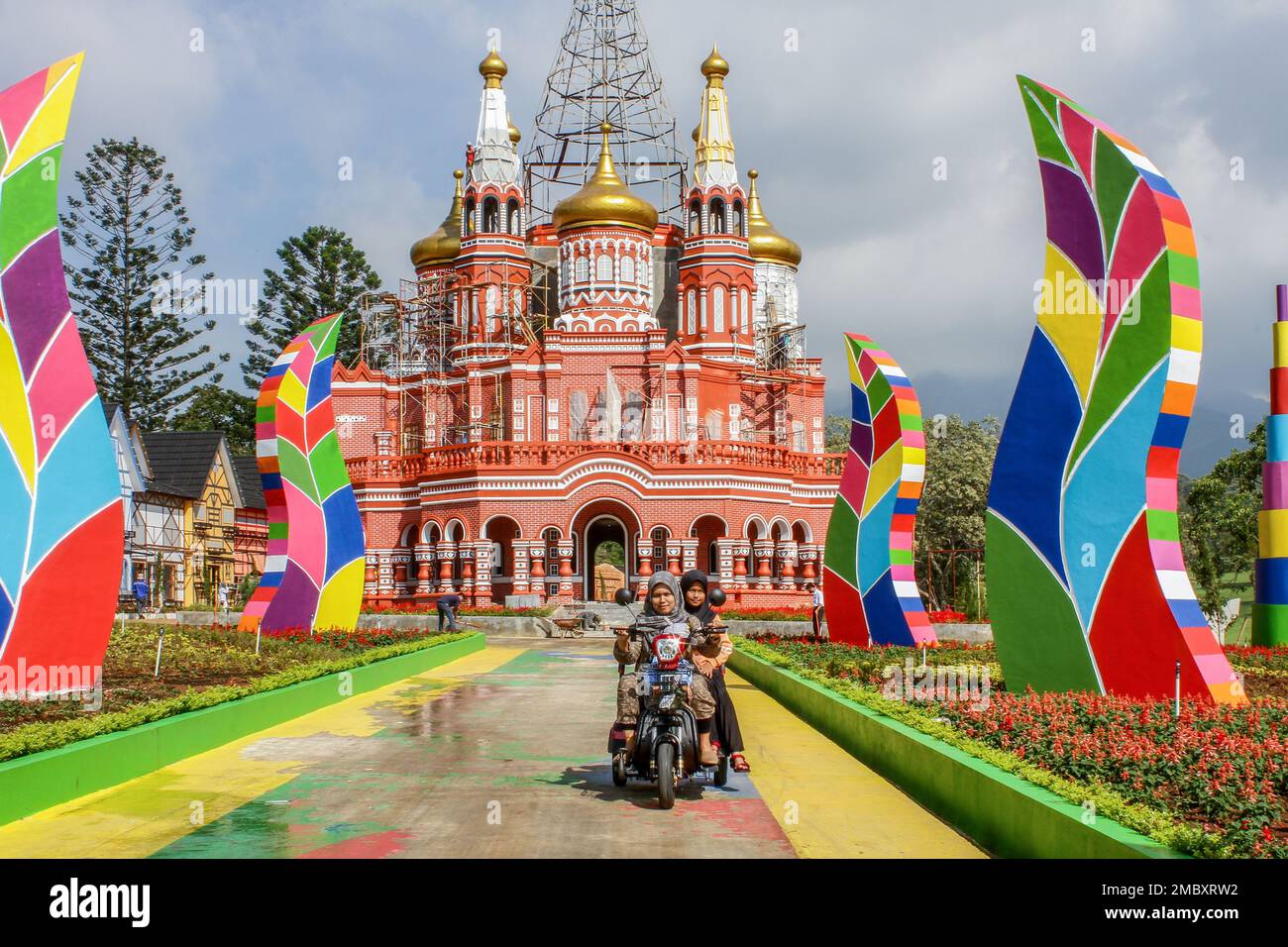 Women ride an electric scooter during Lunar New Year Holidays 2023 in ...
