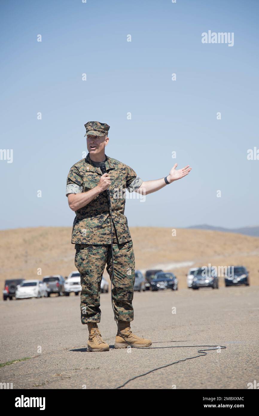 U.S. Marine Corps Col. Brandon Graham, the outgoing commanding officer of 1st Marine Regiment, 1st Marine Division, speaks during a change of command ceremony at Marine Corps Base Camp Pendleton, California, June 23, 2022. During the ceremony, Graham relinquished command of 1st Marine Regiment to Col. Brendan Sullivan. Stock Photo