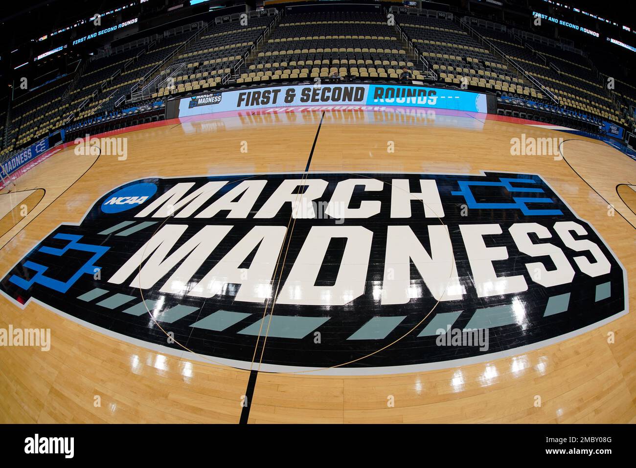 The basketball court at PPG Paints Arena in Pittsburgh is prepared on