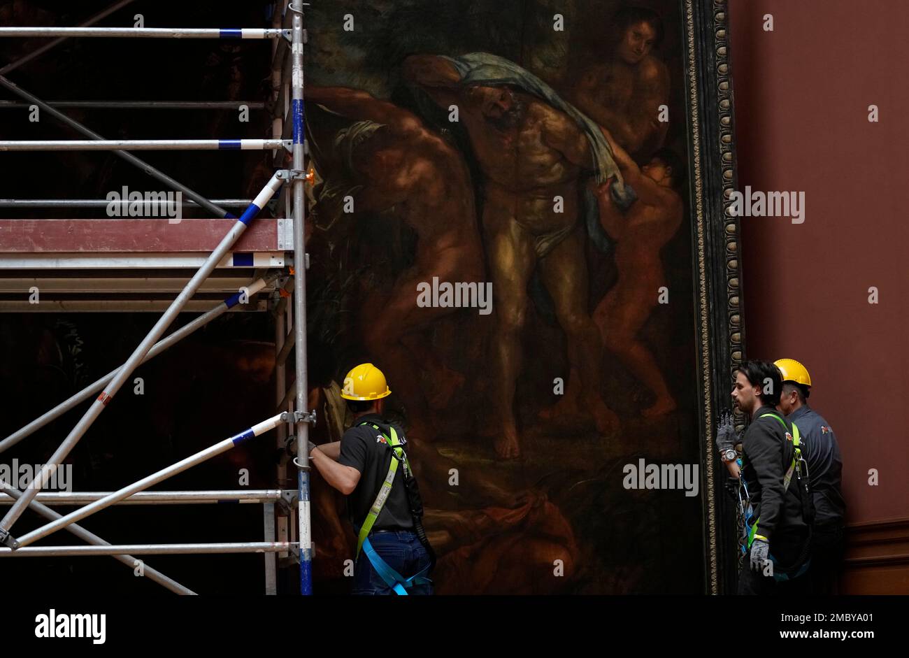 Technicians and art handlers move the 'Baptism of Christ', by Baroque  painter Peter Paul Rubens inside a gallery at the Royal Museum of Fine Arts  Antwerp in Antwerp, Belgium, Tuesday, March 15,