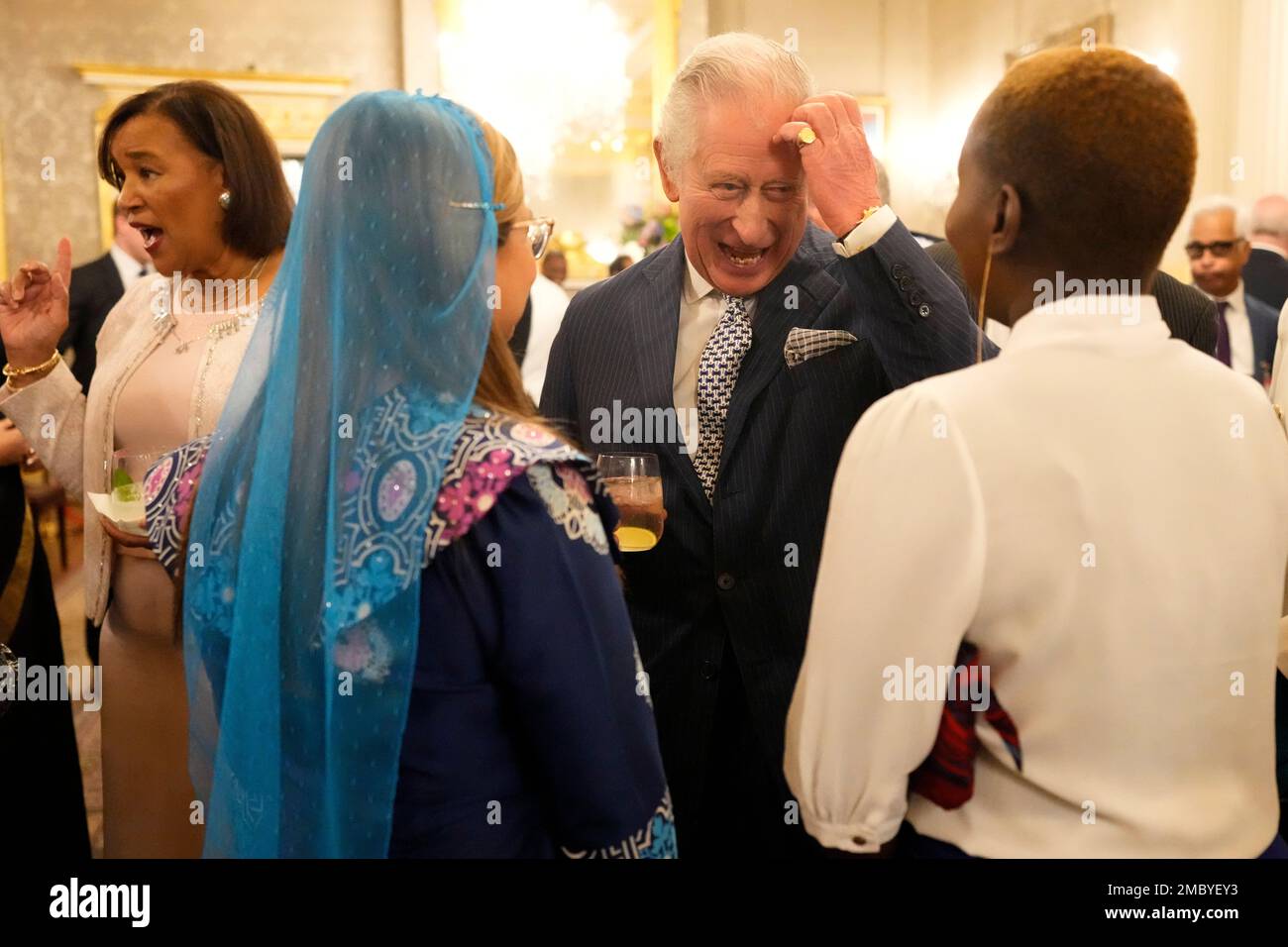 Britain's Prince Charles, the Prince of Wales, speaks to guests at the annual Commonwealth Day Reception which traditionally takes place on Commonwealth Day at Marlborough House, the home of the Commonwealth Secretariat, in London, Monday, March 14, 2022. (AP Photo/Frank Augstein, Pool) Stock Photo
