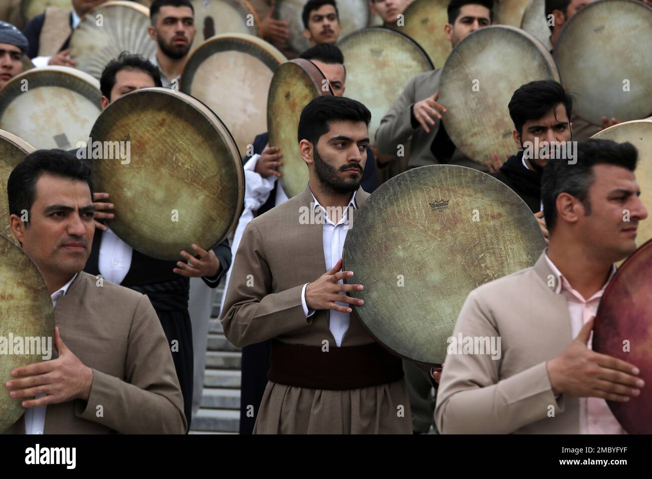 Musicians from the Kurdish western region of Iran play Daf a hand