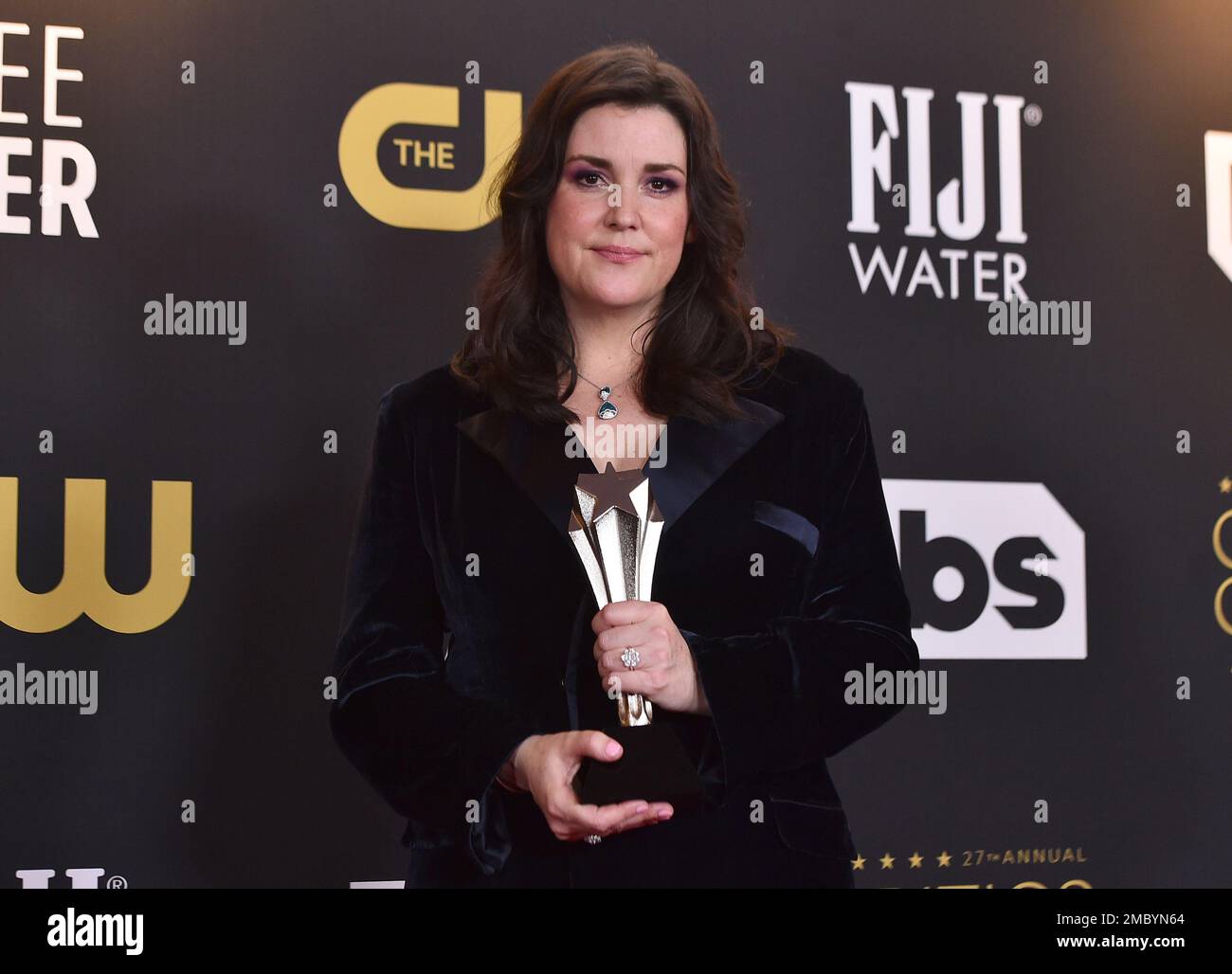 Melanie Lynskey poses in the press room with the award for best actress