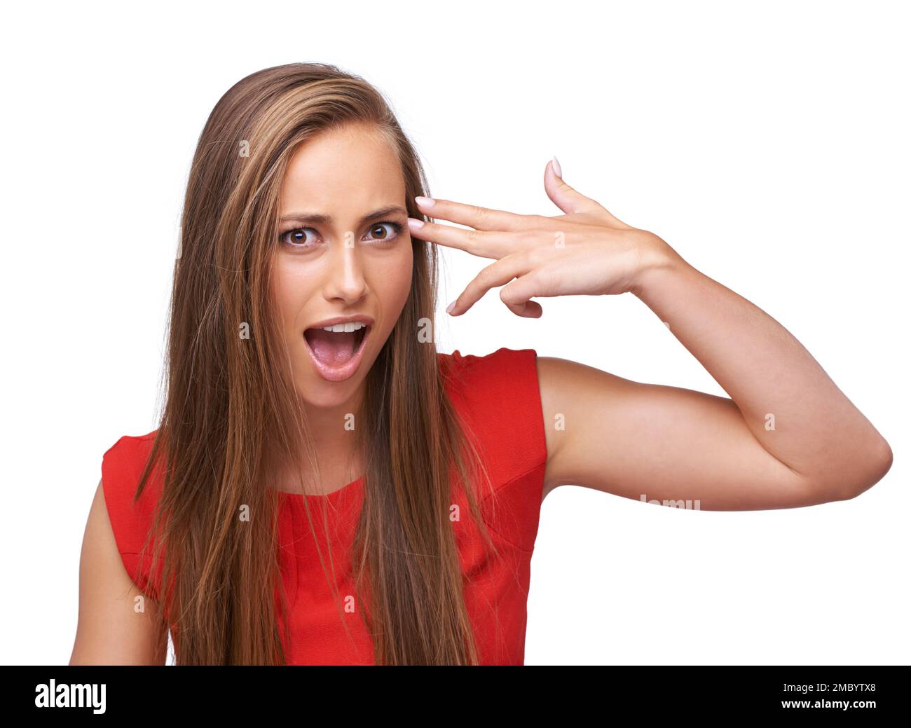 Wow, hand and portrait of a woman with gun for shooting isolated on a white background in studio. Surprise, violence and girl with dark humor, finger Stock Photo