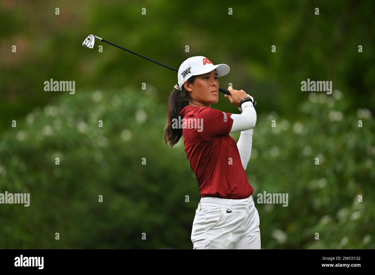 Celine Boutier of France watches her shot on the 12th hole during the final round of the LPGA Honda Thailand golf tournament in Pattaya, southern Thailand, Sunday, March 13, 2022
