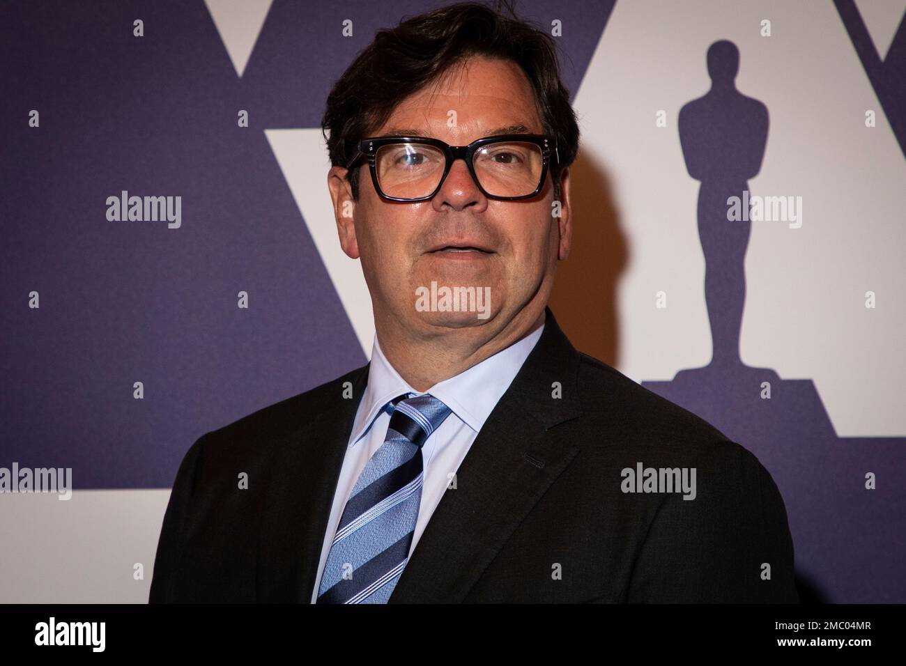 Donald Moheet Donald Mowat poses for photographers upon arrival at the Academy Awards ...