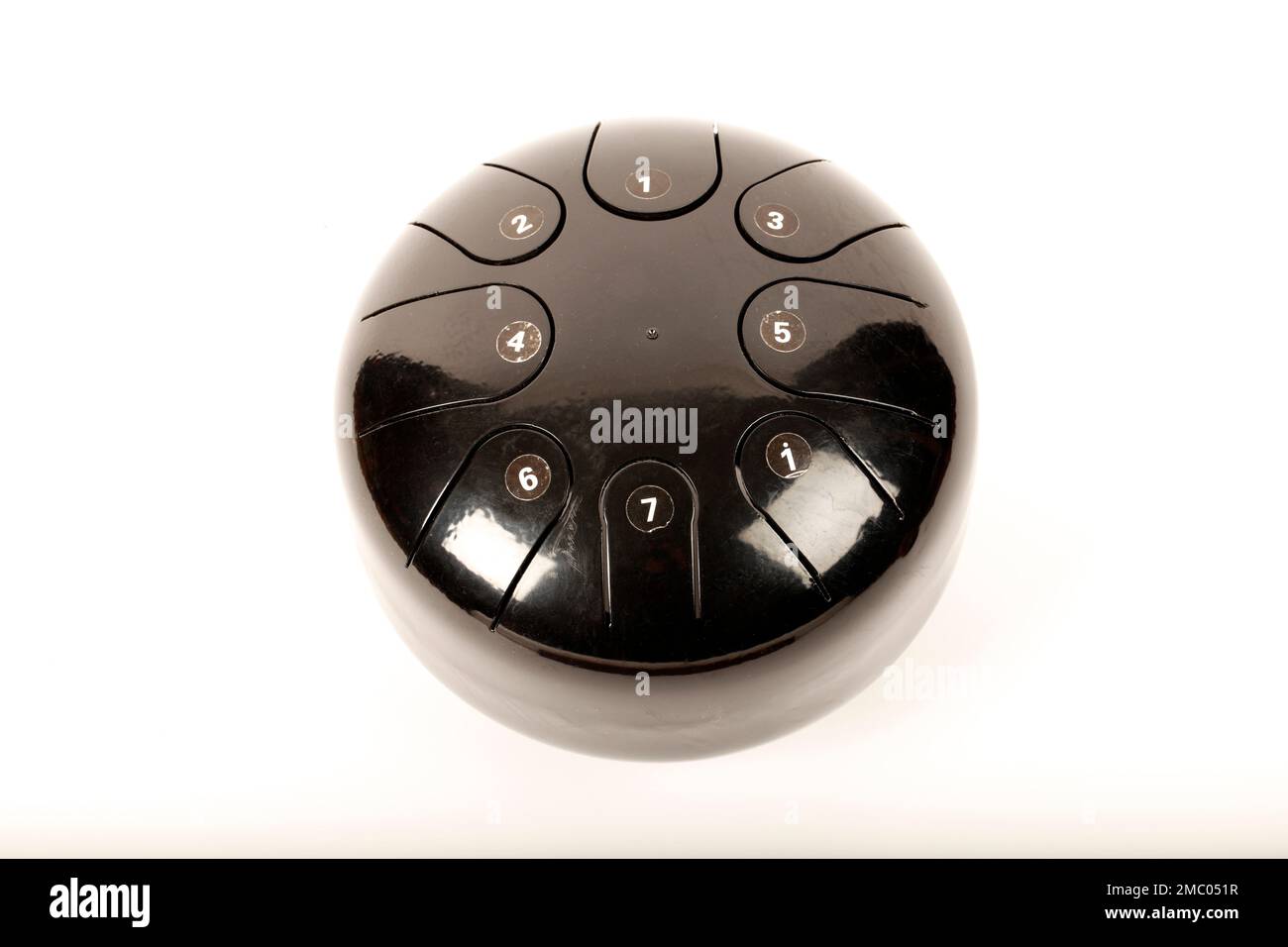 Metal tongue drum, handpan, hand drum, with 8 diatonic pitches. Made of steel Stock Photo Alamy