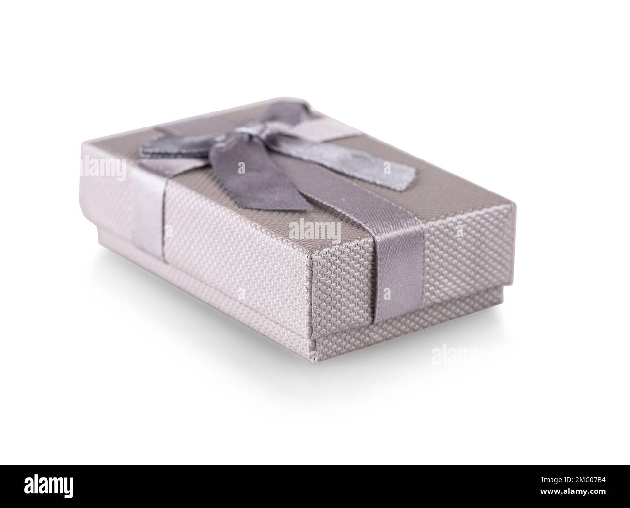 The gray shiny gift bandaged box isolated on white background Stock ...