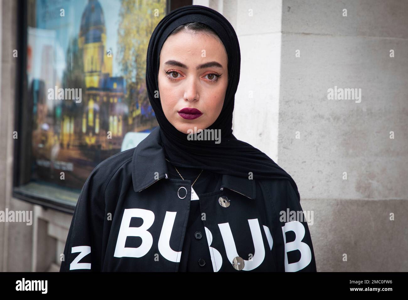 Leena Al Ghouti Poses For Photographers Upon Arrival At The Burberry leena-al-ghouti-poses-for-photographers-upon-arrival-at-the-burberry