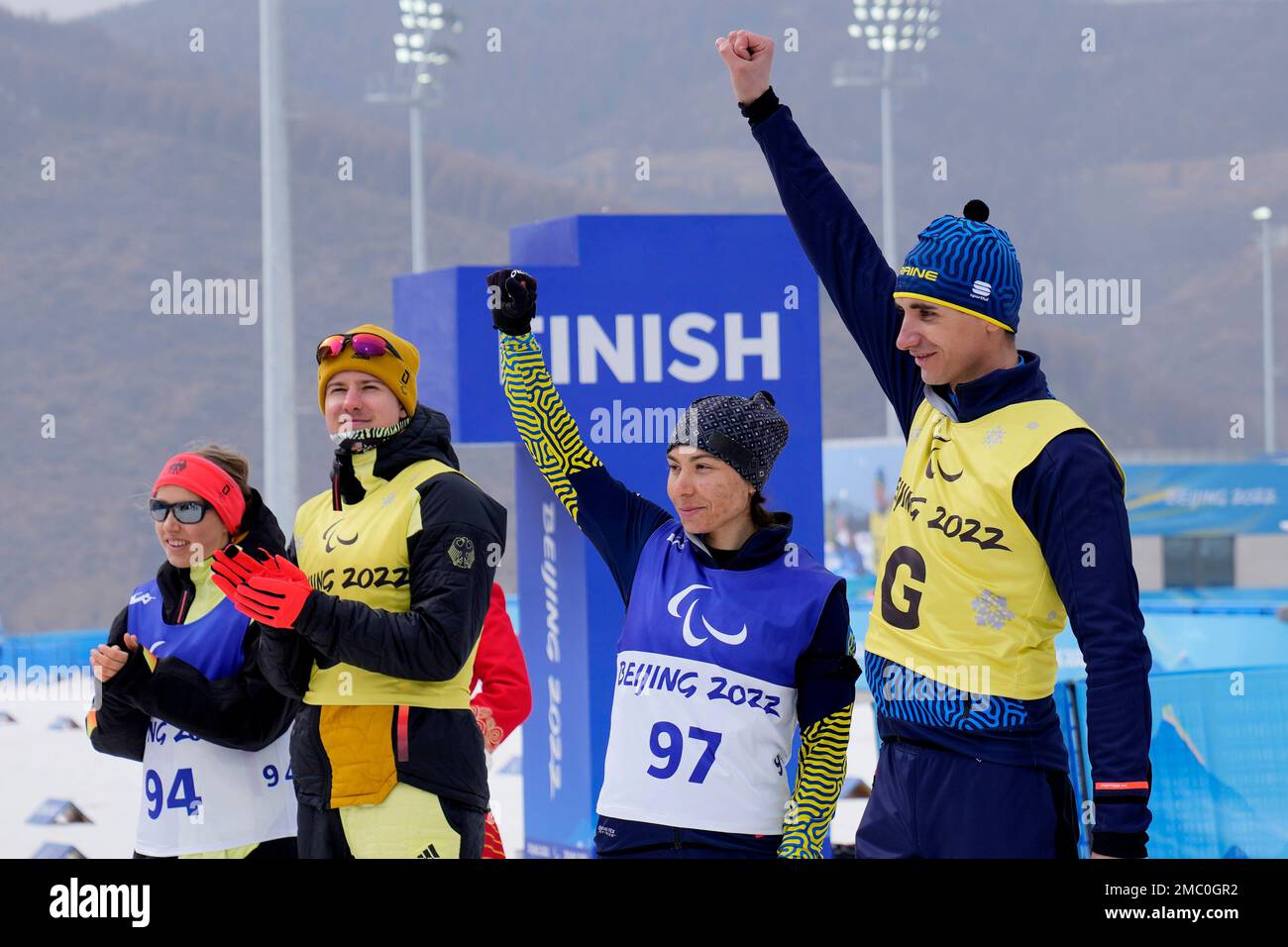 Gold medalist Ukraine's Oksana Shyshkova, second right, with guide ...
