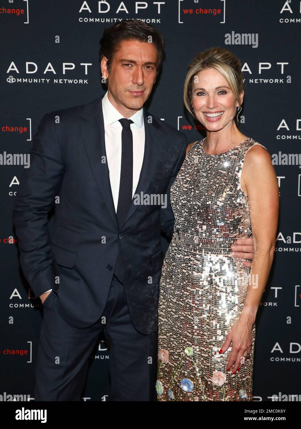 Television journalists David Muir, left, and Amy Robach, right, attend(07)