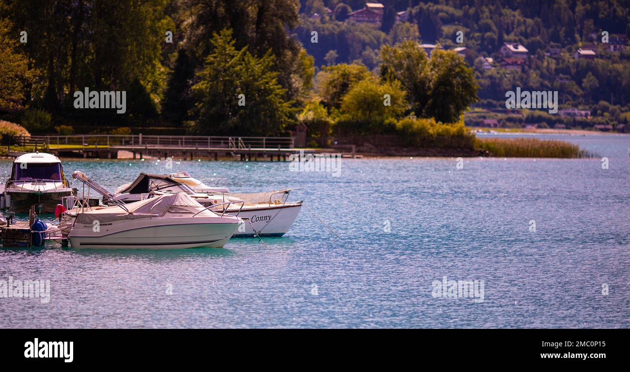 Villach, Austria - 2022 September 4 : Faaker See, small village on the lake, boat parking, Austria Stock Photo