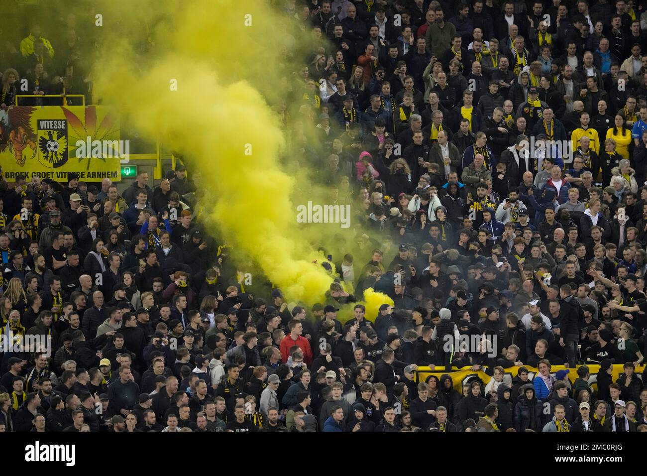 fans set off flares during the round of sixteen, first Conference League soccer Vitesse and AS Roma at Gelredome stadium in Arnhem, Netherlands, Thursday, March 10, 2022. (AP