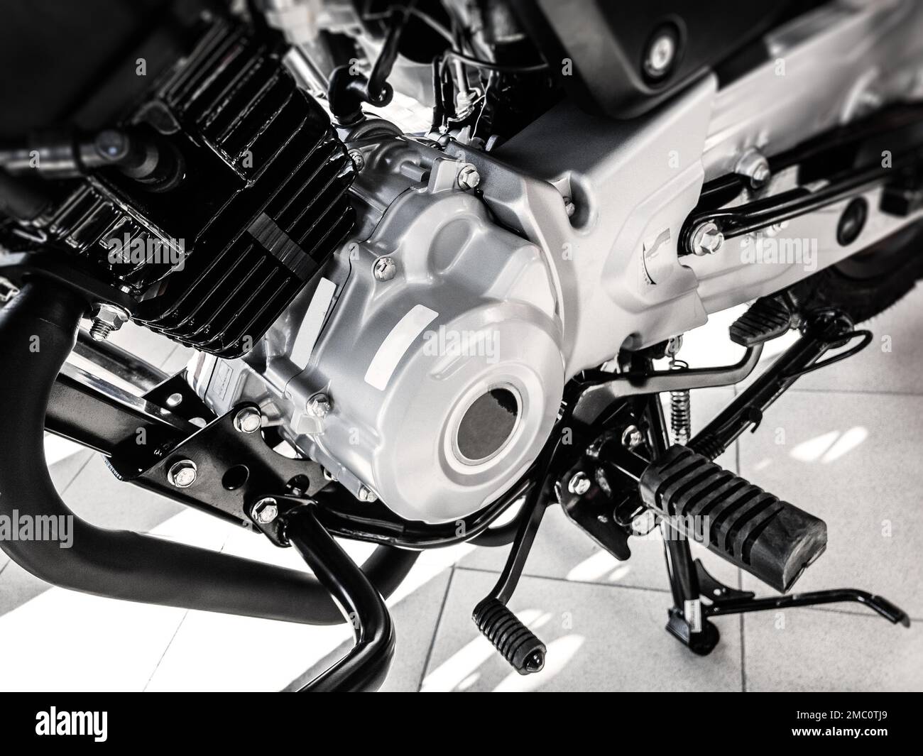 motor of brand new cross-country enduro motorcycle, black white, closeup Stock Photo