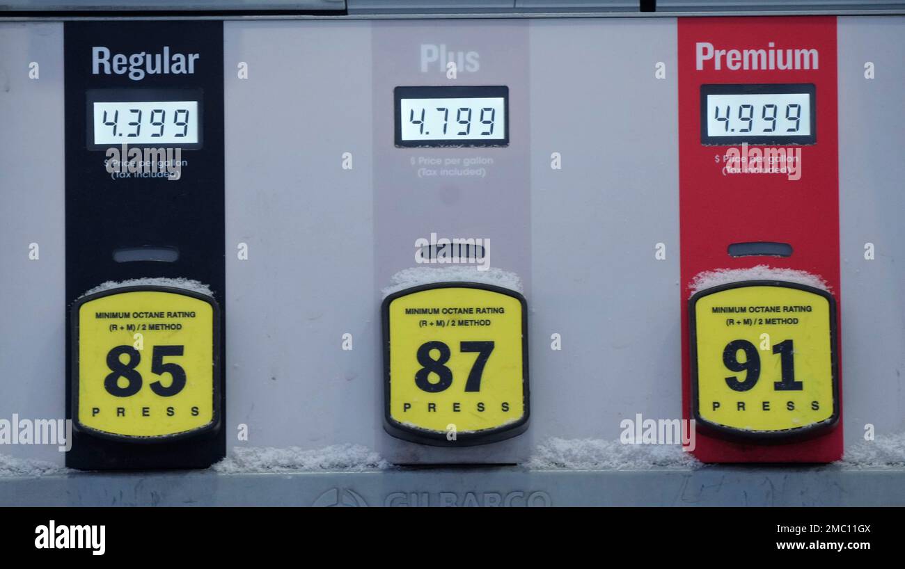 Prices for various grades of gas are posted on the digital readouts of