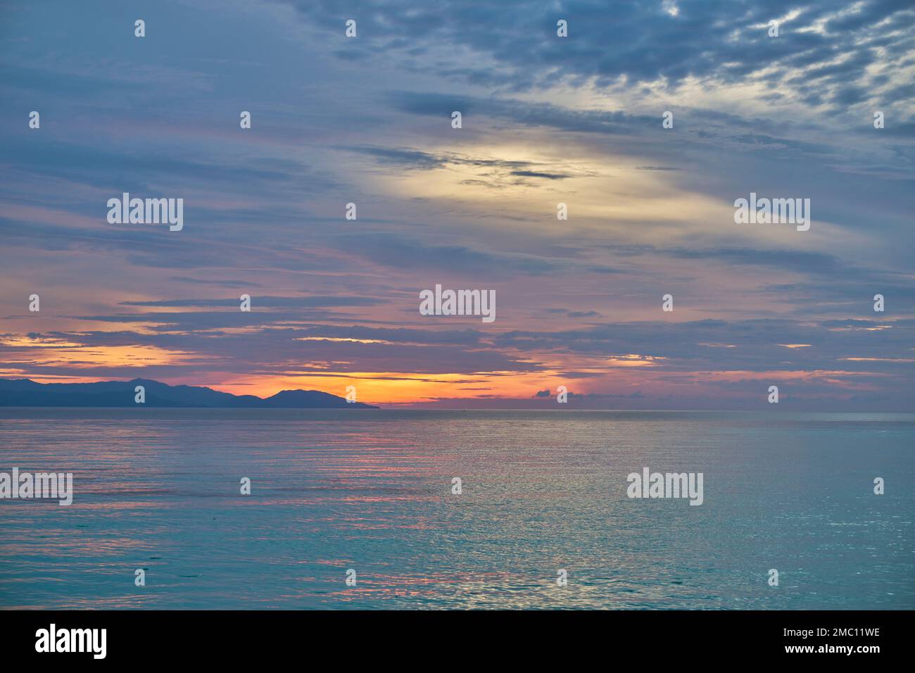 The sun going down over Raja Ampat Islands, Indonesia Stock Photo