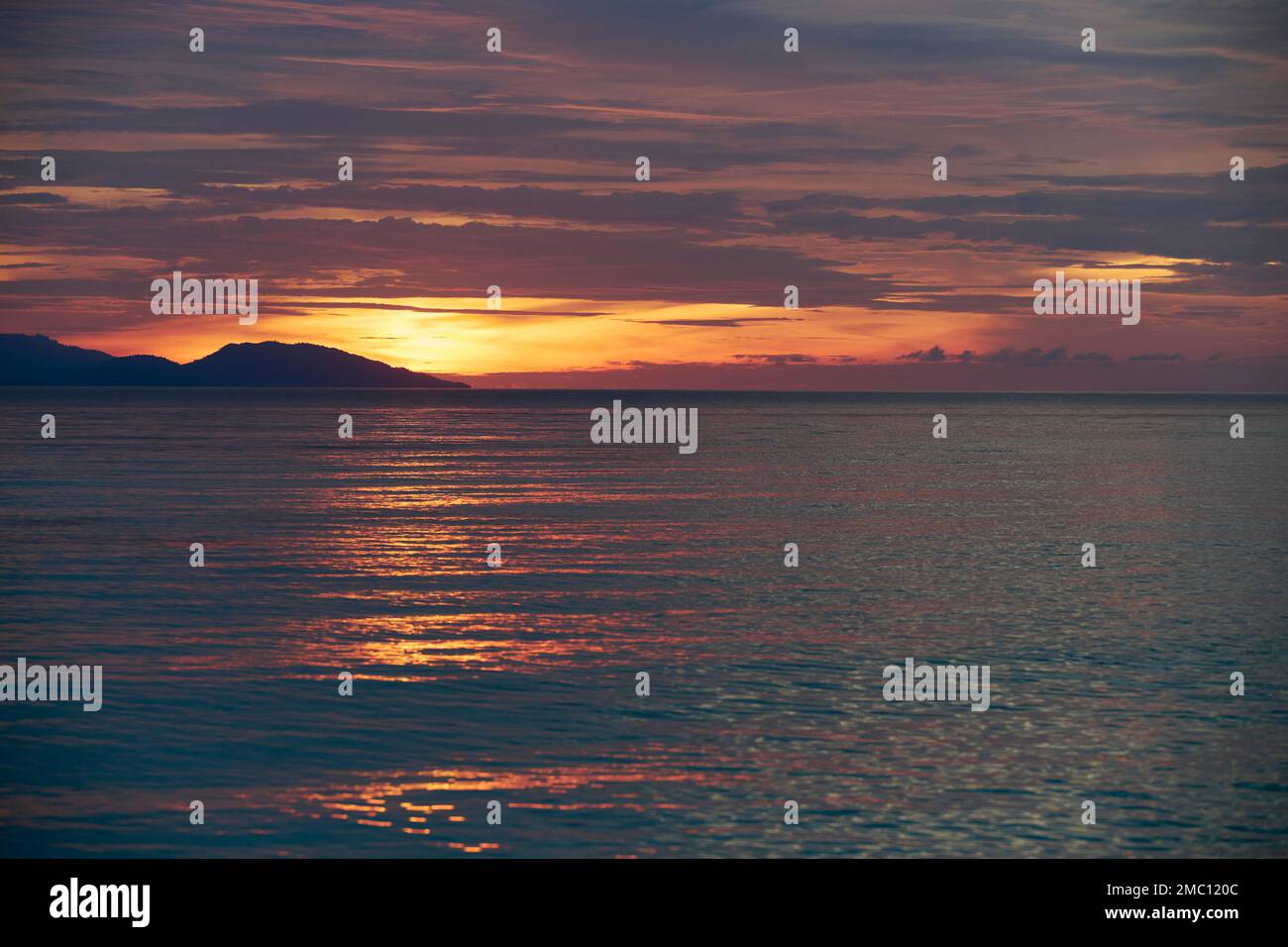 The sun going down over Raja Ampat Islands, Indonesia Stock Photo