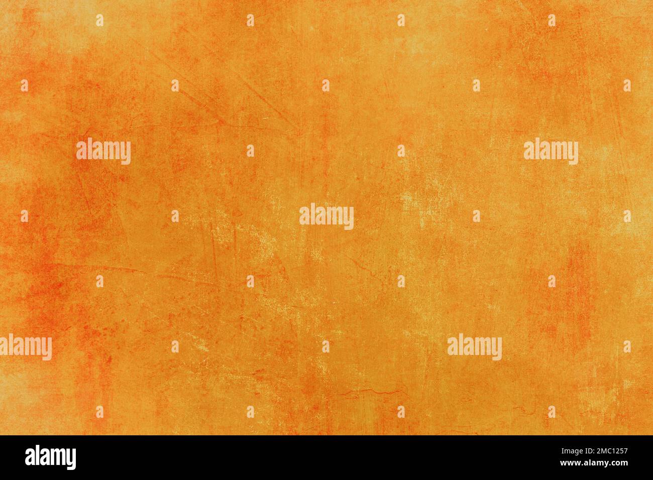 Golden colored wall grunge background Stock Photo