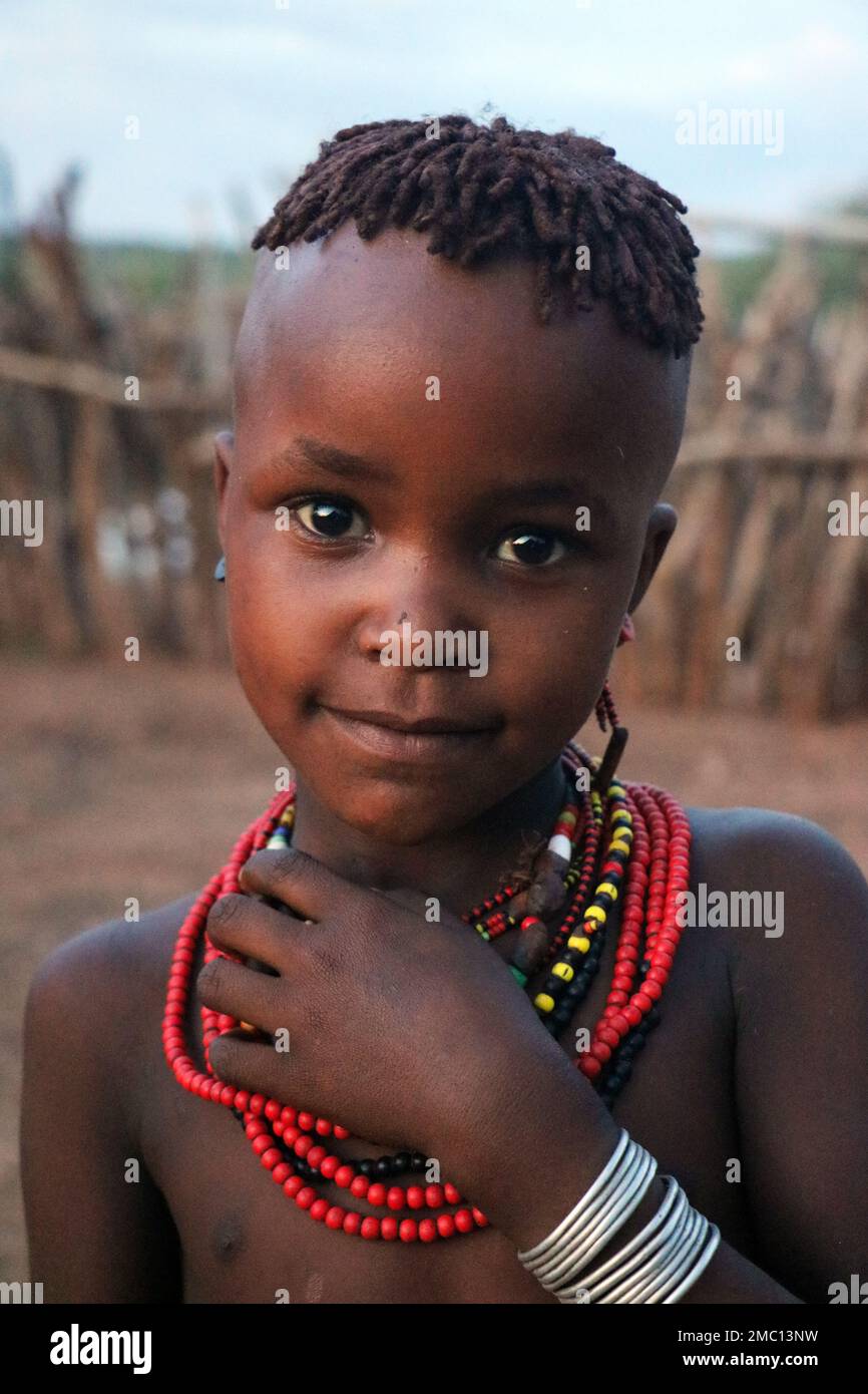 Portrait of ethiopian child in lower Omo valley village, Ethiopia Stock Photo