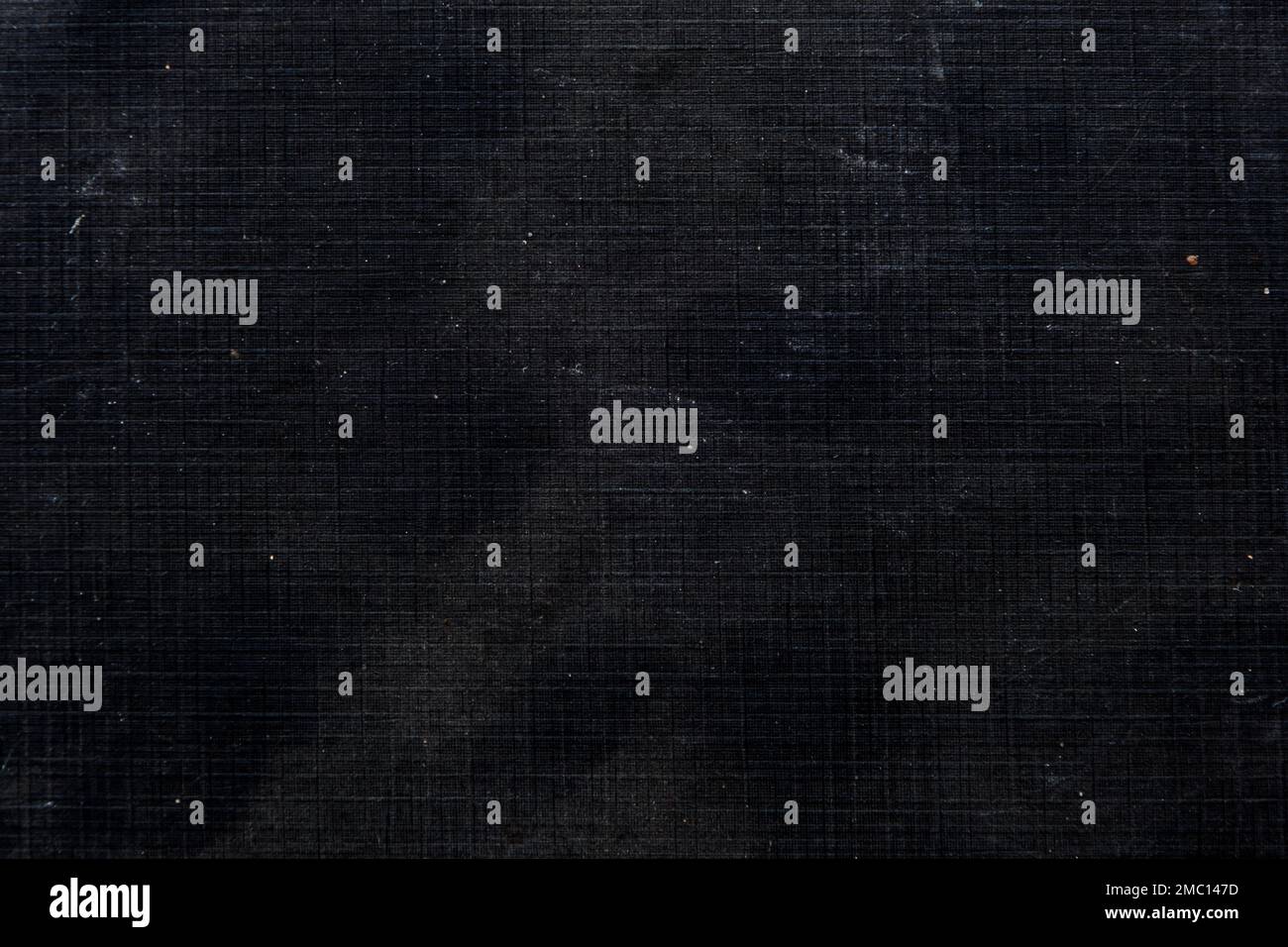 Old threadbare black canvas grunge texture Stock Photo