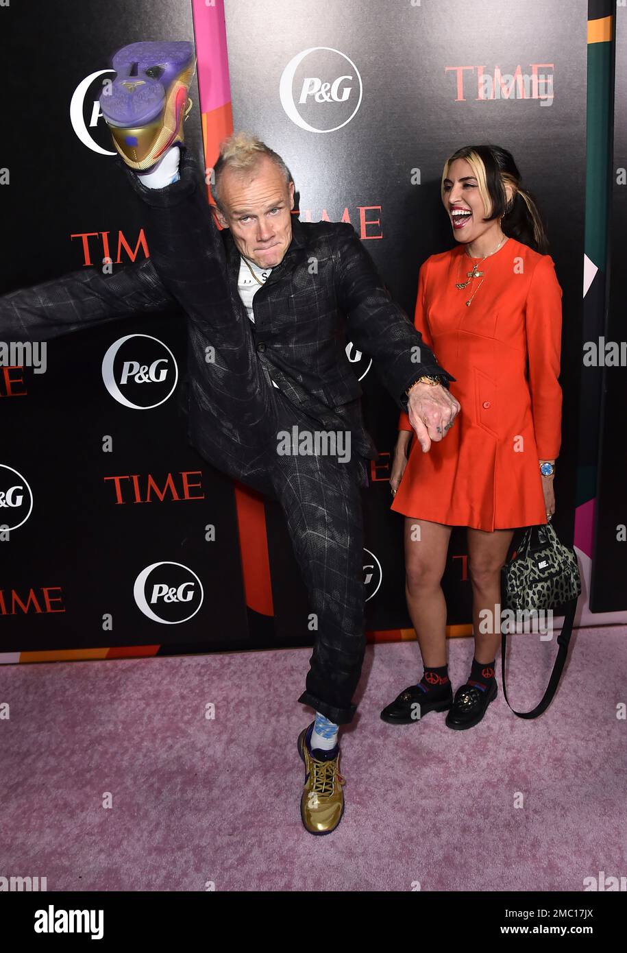 Flea of Red Hot Chili Peppers and Melody Ehsani arrive at the Time