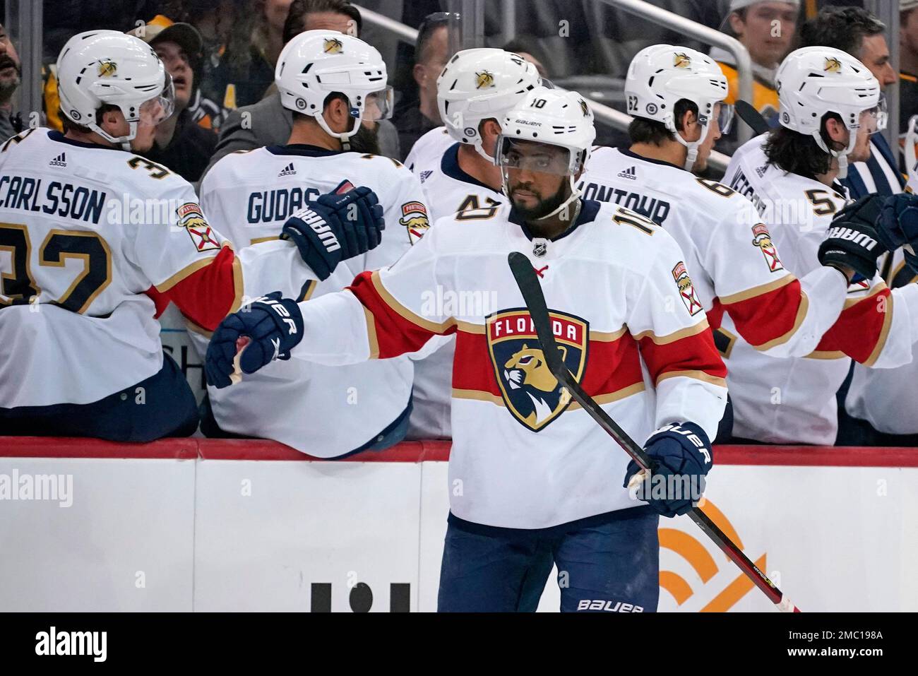 Florida Panthers' Anthony Duclair (10) returns to the bench after scoring  during the second period of an NHL hockey game against the Pittsburgh  Penguins in Pittsburgh, Tuesday, March 8, 2022. (AP Photo/Gene