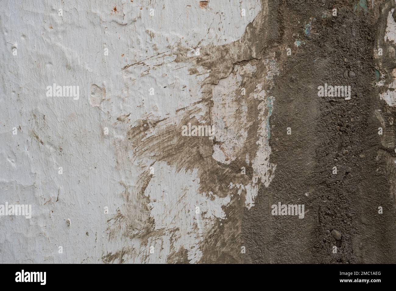 Cement render plaster coating on old white lime washed wall Stock Photo