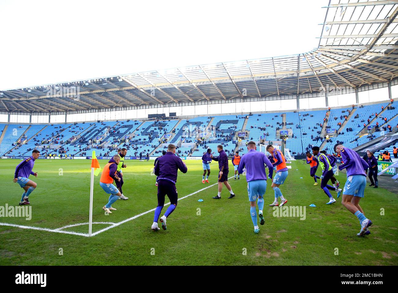 Coventry City players warm up on the pitch ahead of the Sky Bet Championship match at the Coventry Building Society Arena, Coventry. Picture date: Saturday January 21, 2023. Stock Photo