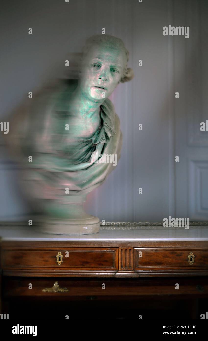 historic bust of man on antique chest Stock Photo Alamy