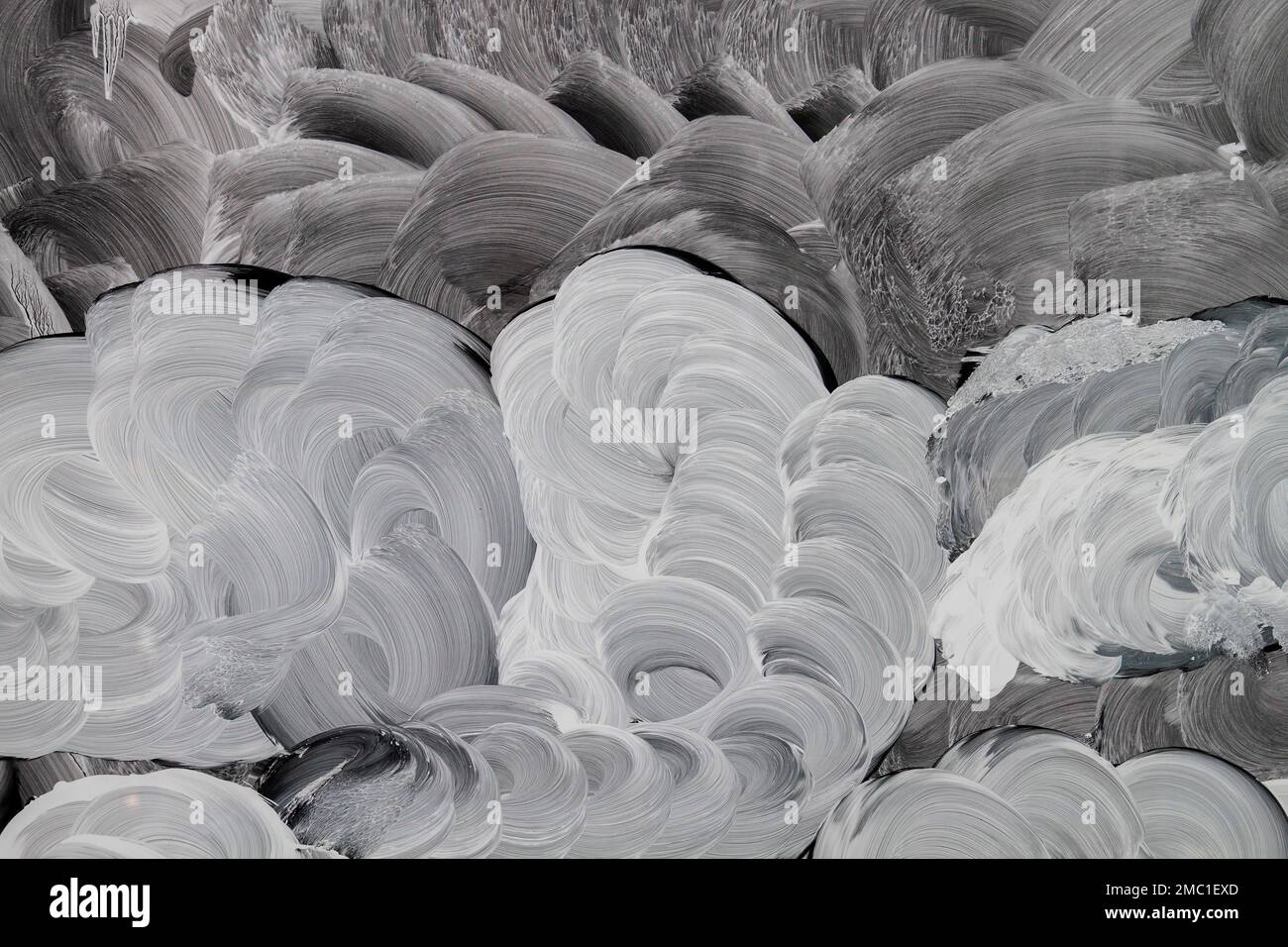 White paint strokes on a shop window, abstract background or texture ...
