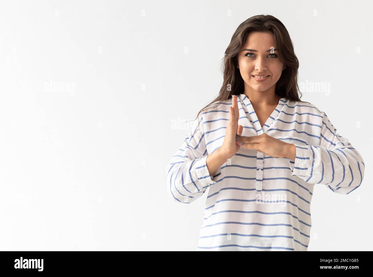 Portrait woman teaching sign language Stock Photo