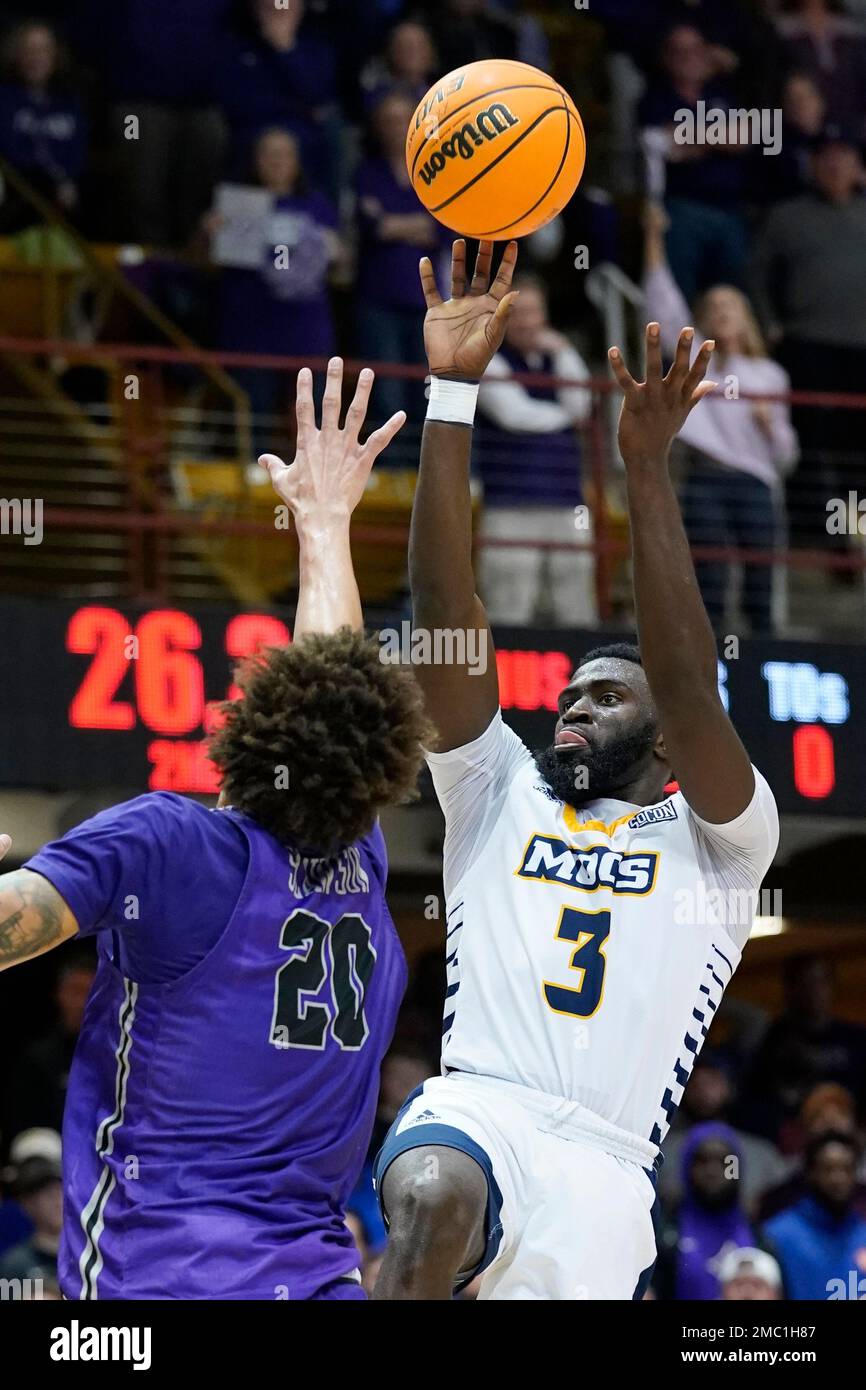 Chattanooga guard David JeanBaptiste (3) shoots over Furman forward
