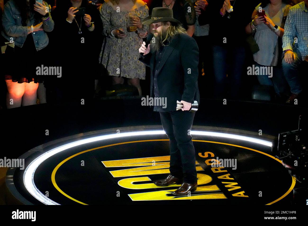 Chris Stapleton accepts the award for male artist of the year at the