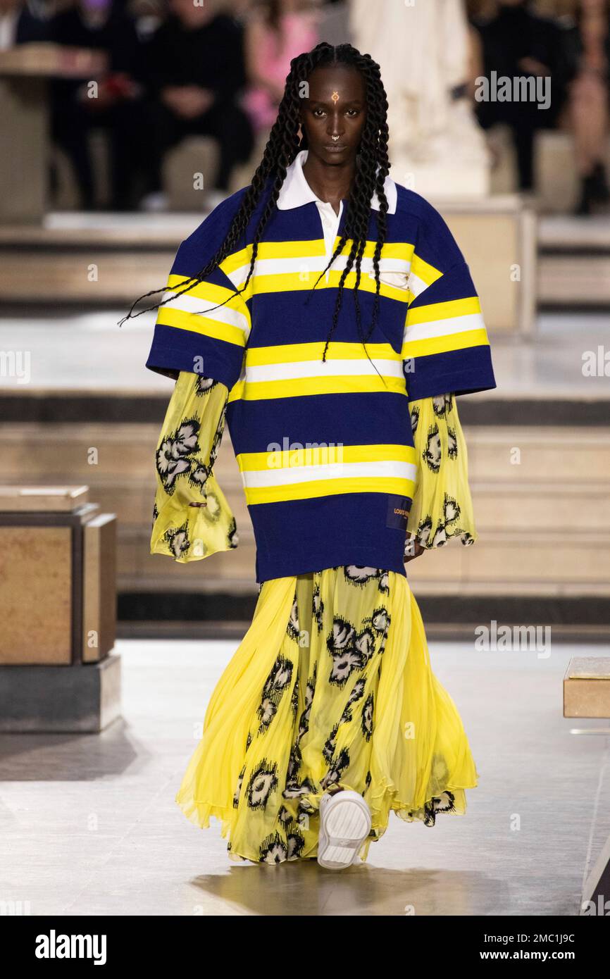 Marie-Pierra Kakoma, known professionally as Lous and the Yakuza wears a  creation as part of the Louis Vuitton Ready To Wear Fall/Winter 2022-2023  fashion collection, unveiled during the Fashion Week in Paris,