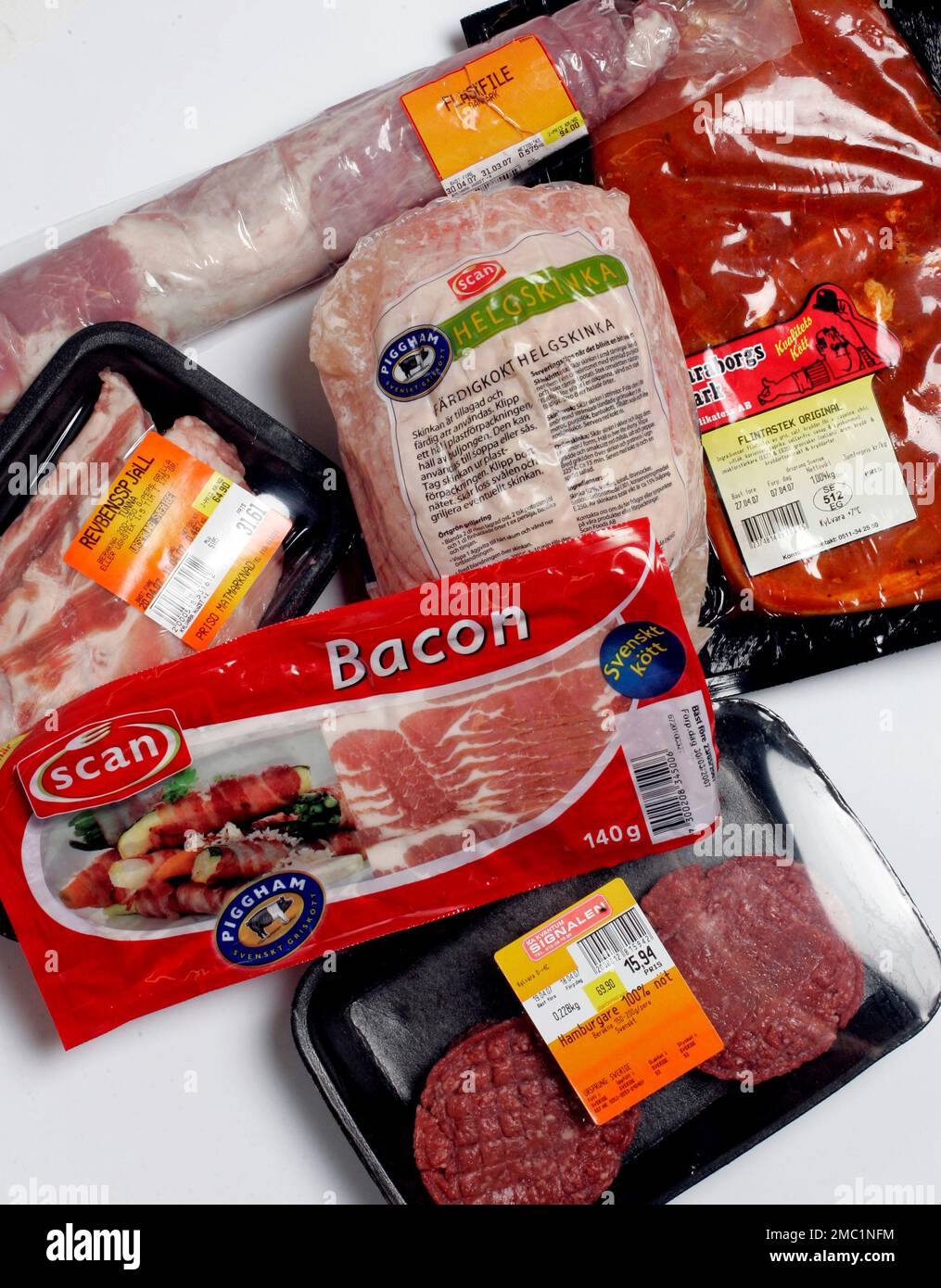 Different kinds of meat, photographed in a studio, here a bacon